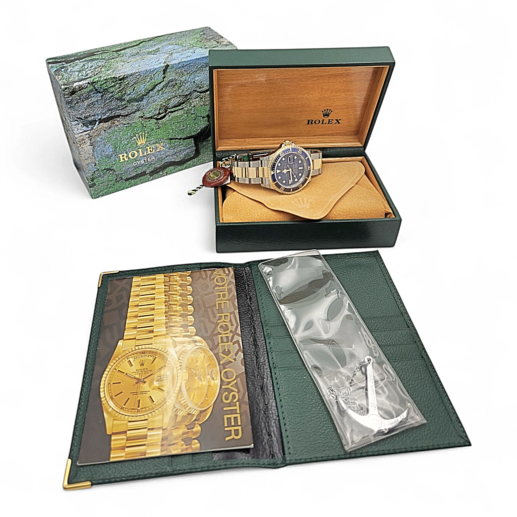 2005 Men's Rolex 40mm Submariner Oyster Perpetual Two Tone 18K Yellow Gold / Stainless Steel Watch with Blue Dial and Blue Bezel. (UNWORN 16613)