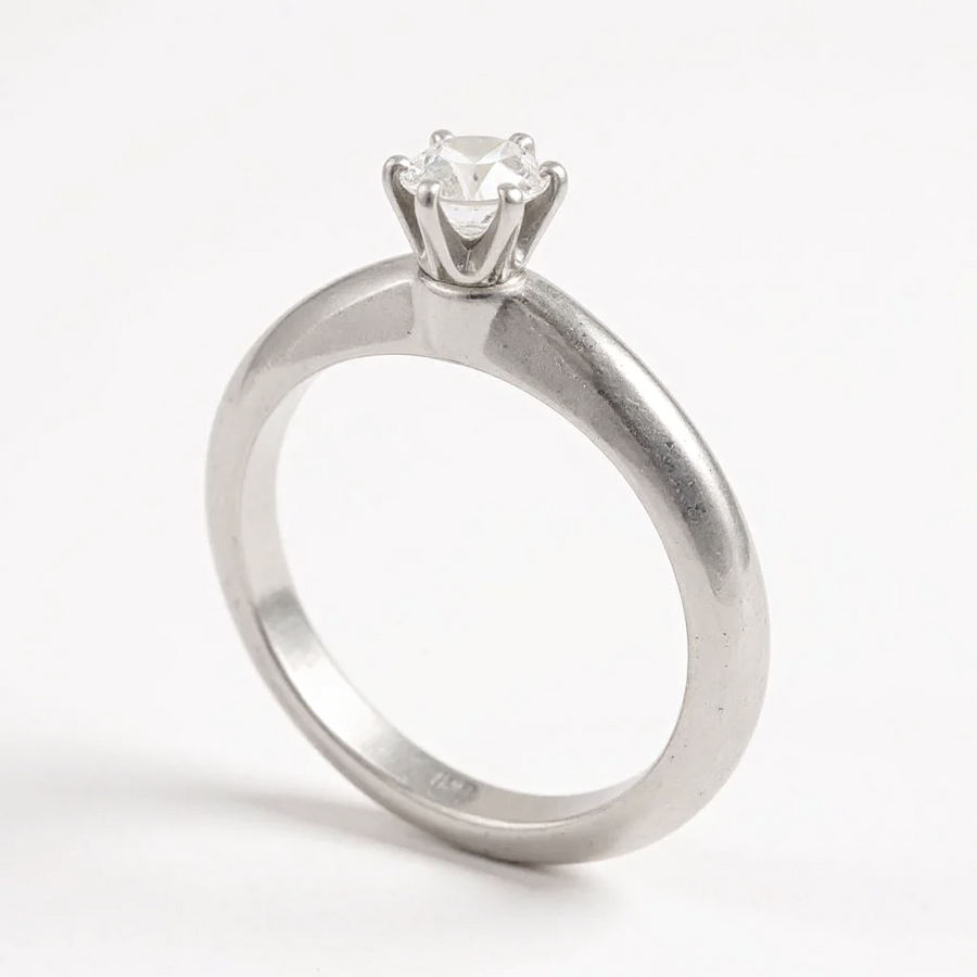 Tiffany & Co. Solitaire Round Cut 0.22 Ct. Diamond I Color, VS2 Clarity Platinum Engagement Ring. (Pre-Owned)