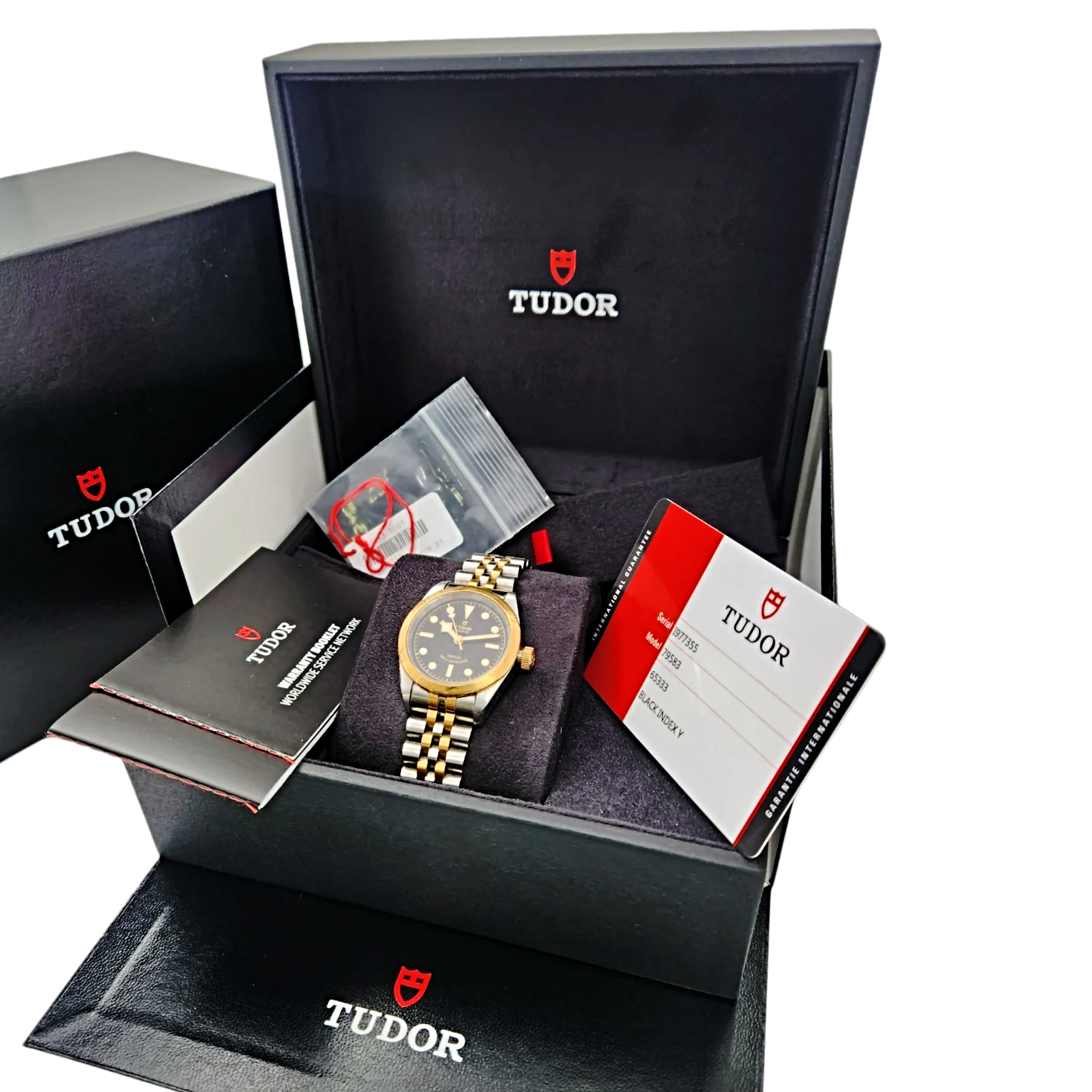 Ladies Tudor Black Bay 32mm Automatic 18K Yellow Gold / Stainless Steel Watch with Black Dial. (Pre-Owned M79583)