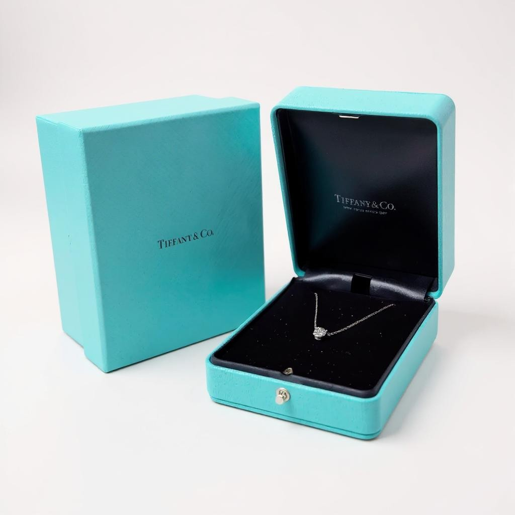 Tiffany & Co. 0.91 Carat Round VS1 / H Diamond Pendant with Platinum 16" Solitaire Necklace. (Pre-Owned)