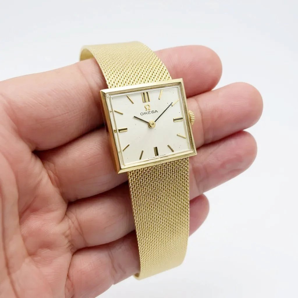 Unisex Omega 23mm Vintage 14K Yellow Gold Watch with Mesh Band and Silver Dial. (Pre-Owned)