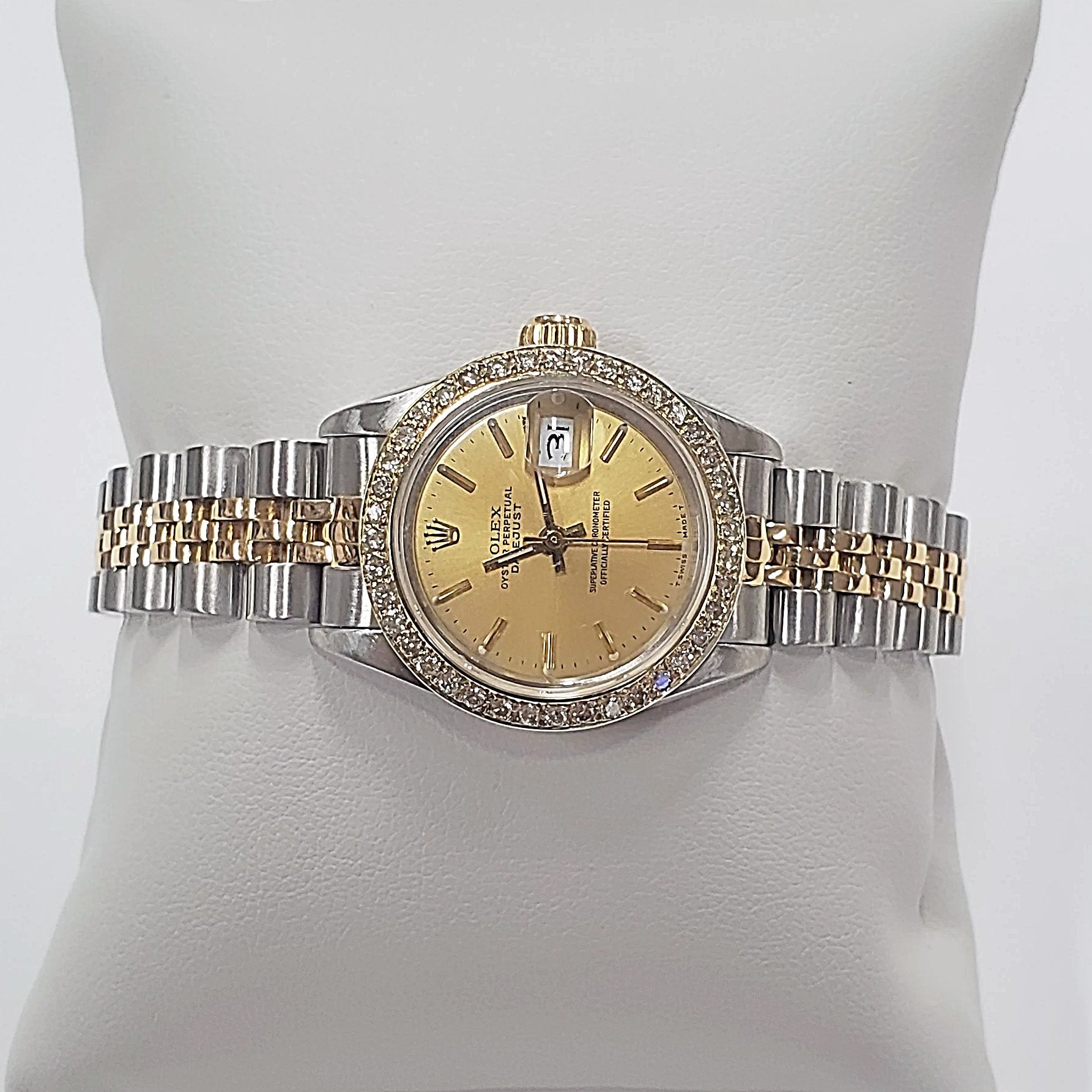 Ladies Rolex 26mm DateJust Two Tone 18K Gold Watch with Champagne Dial and Custom Diamond Bezel. (Pre-Owned)