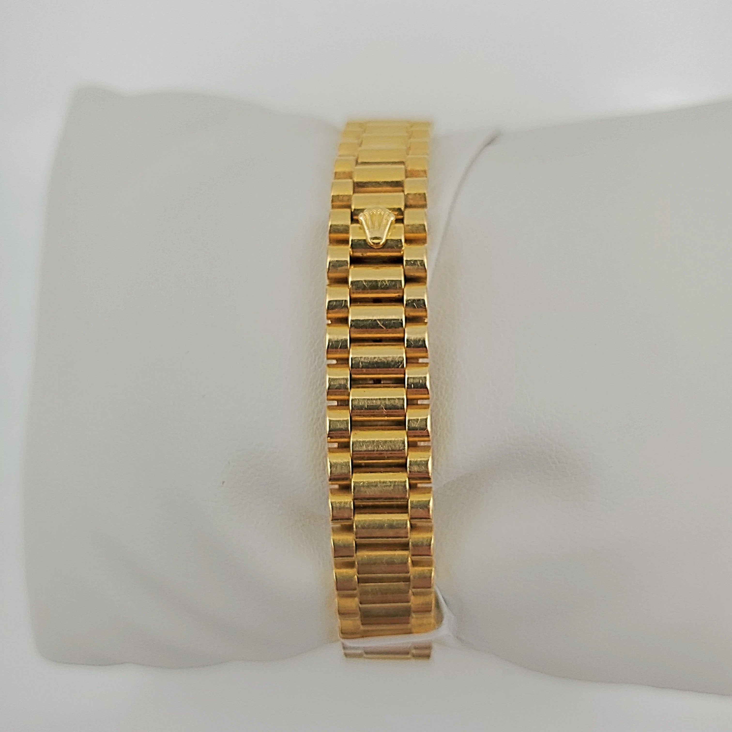 Ladies Rolex 26mm Presidential 18K Yellow Gold Watch with Mother of Pearl Diamond Dial and Diamond Bezel. (Pre-Owned)