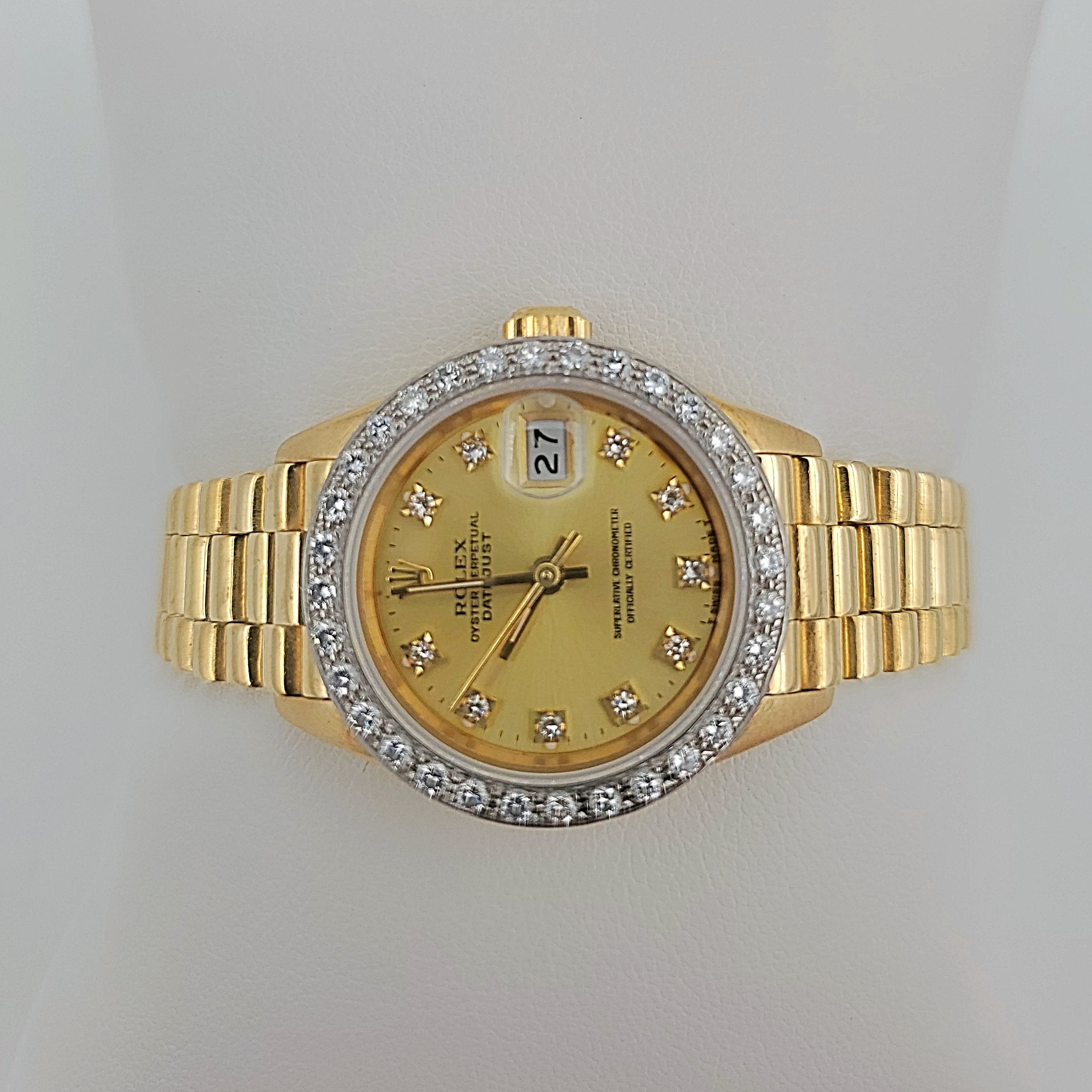 Ladies Rolex 26mm Presidential 18K Yellow Gold Watch with Champagne Diamond Dial and Diamond Bezel. (Pre-Owned)