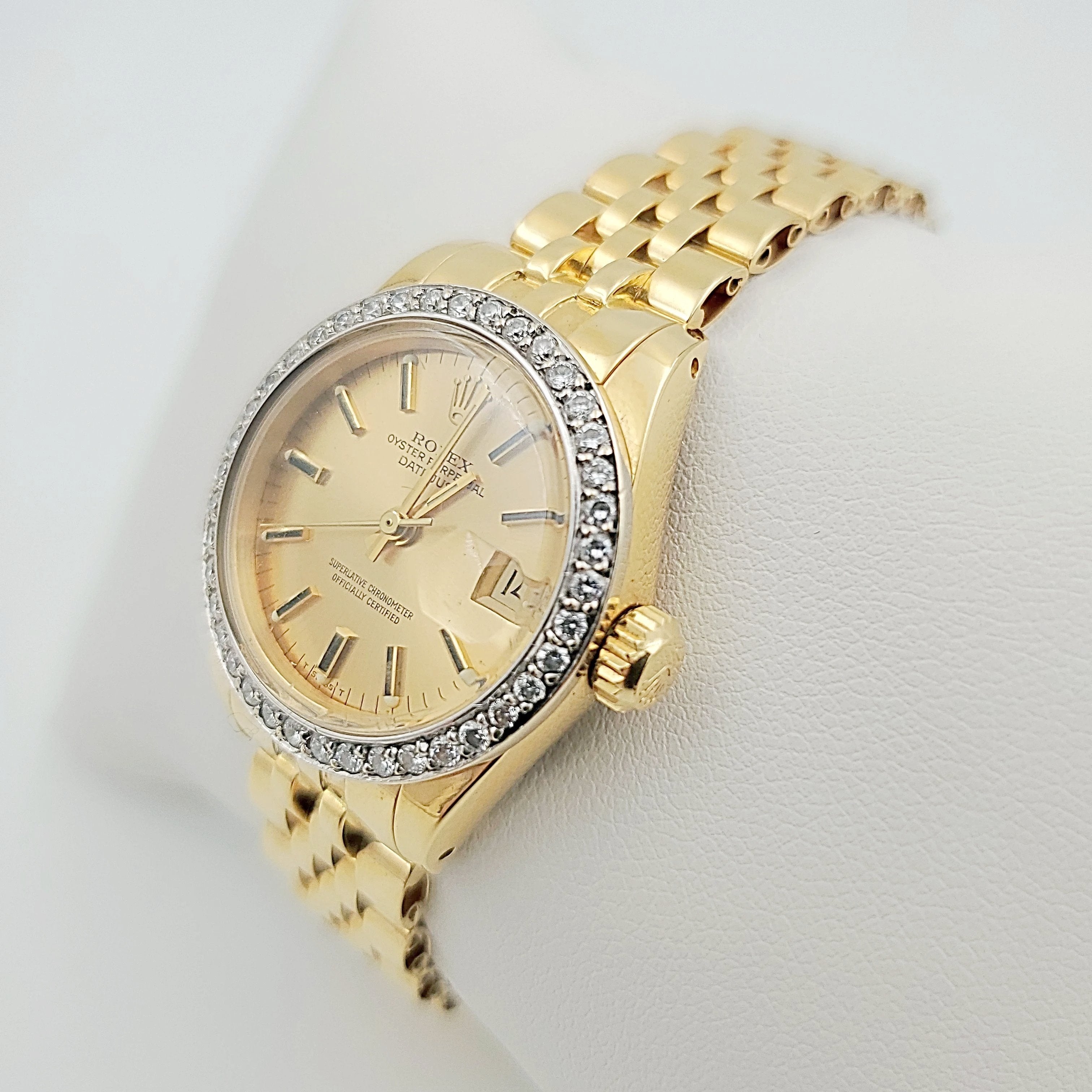 Women's Rolex 26mm DateJust 18K Yellow Gold Watch with Champagne Dial and Custom Diamond Bezel. (Pre-Owned)