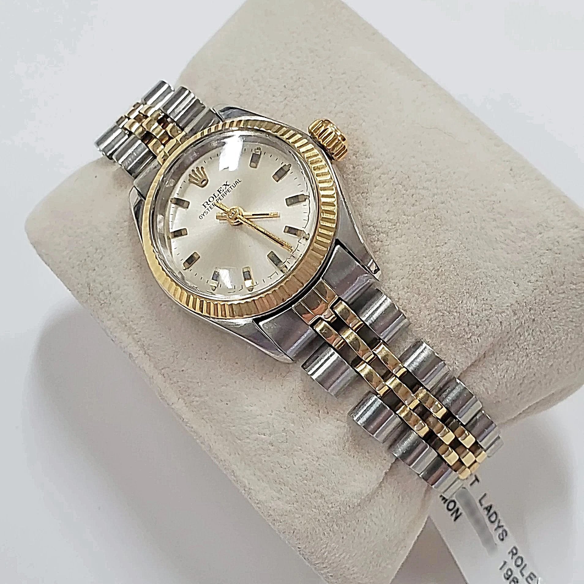Ladies Rolex 26mm Two Tone DateJust 14K Gold Watch with Silver Dial and Fluted Bezel. (Pre-Owned)