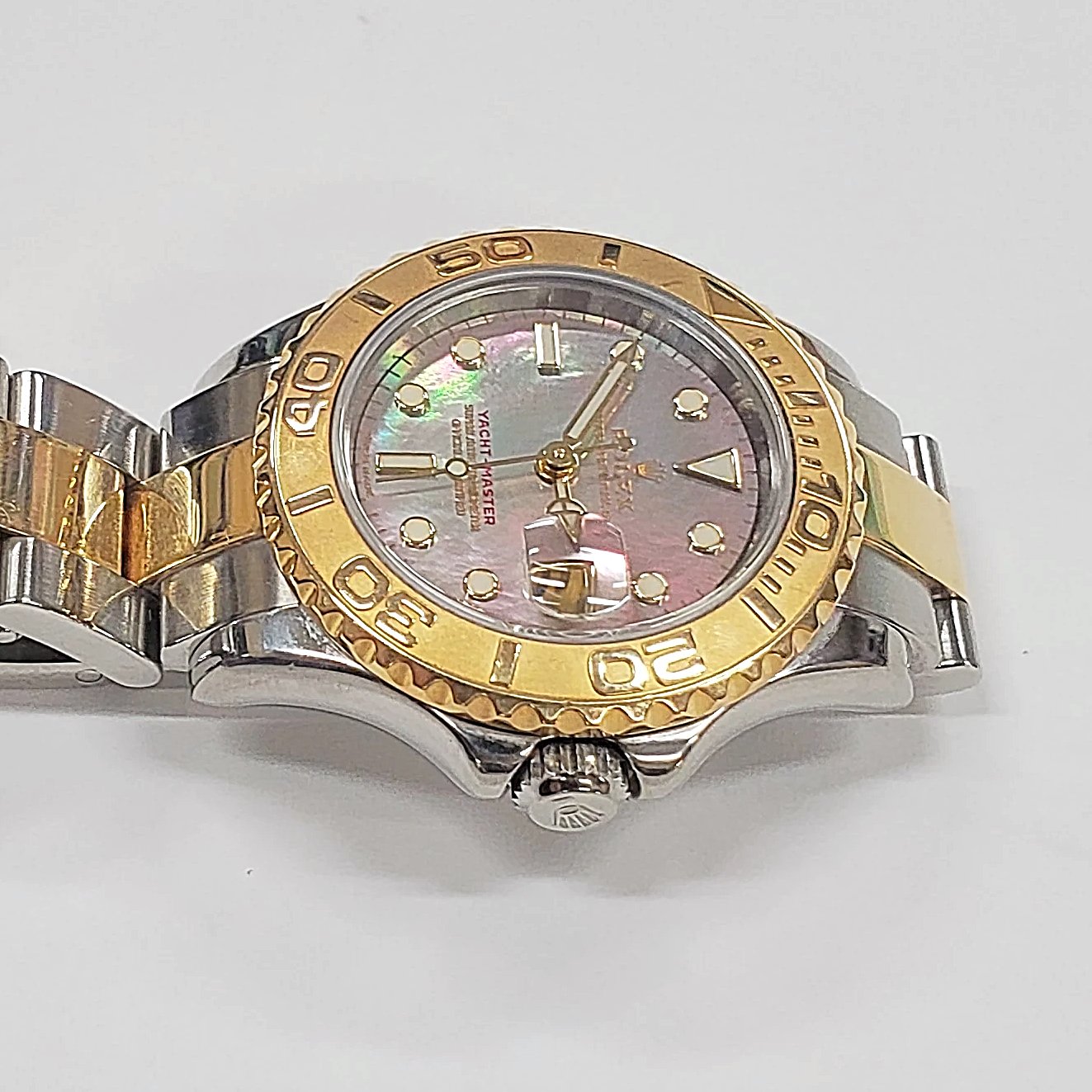 Ladies Rolex 29mm Two Tone 18K Gold Yachtmaster Watch with Black Mother of Pearl Dial and Rotatable Bezel. (Pre-Owned)