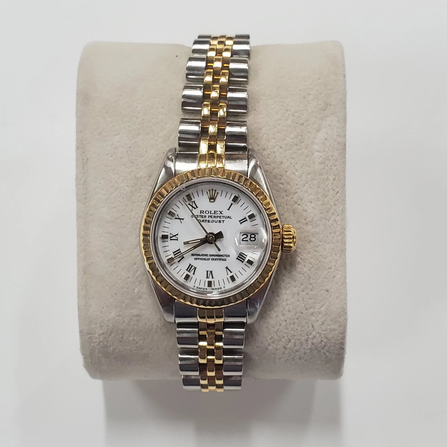 Ladies Rolex 26mm DateJust Two Tone 18K Gold Watch with Fluted Bezel, White Dial and Roman Numerals. (Pre-Owned)