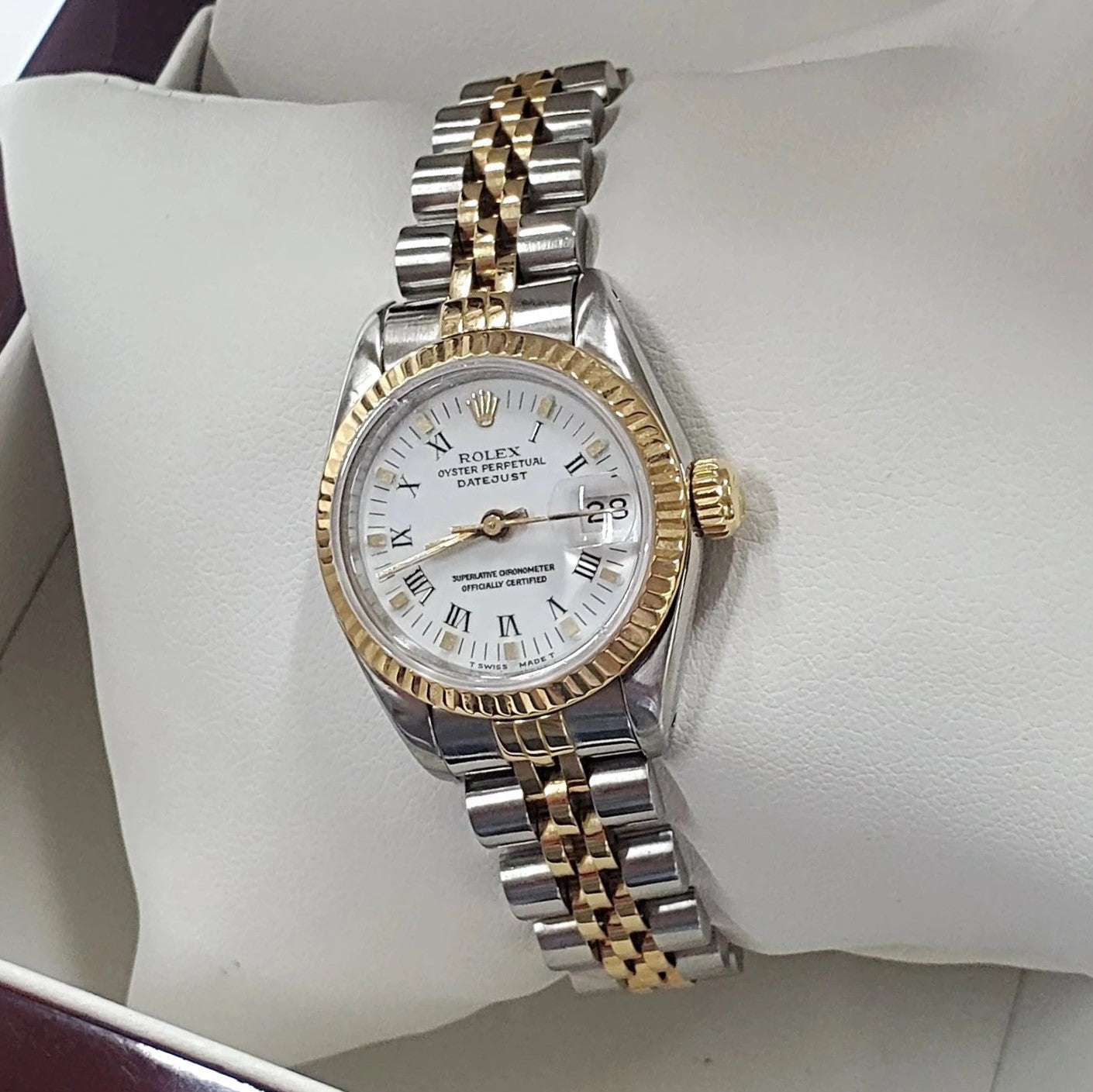 Women's Rolex 26mm DateJust Two-Tone 18K Gold Watch with Fluted Bezel, White Dial and Roman Numerals. (Pre-Owned)
