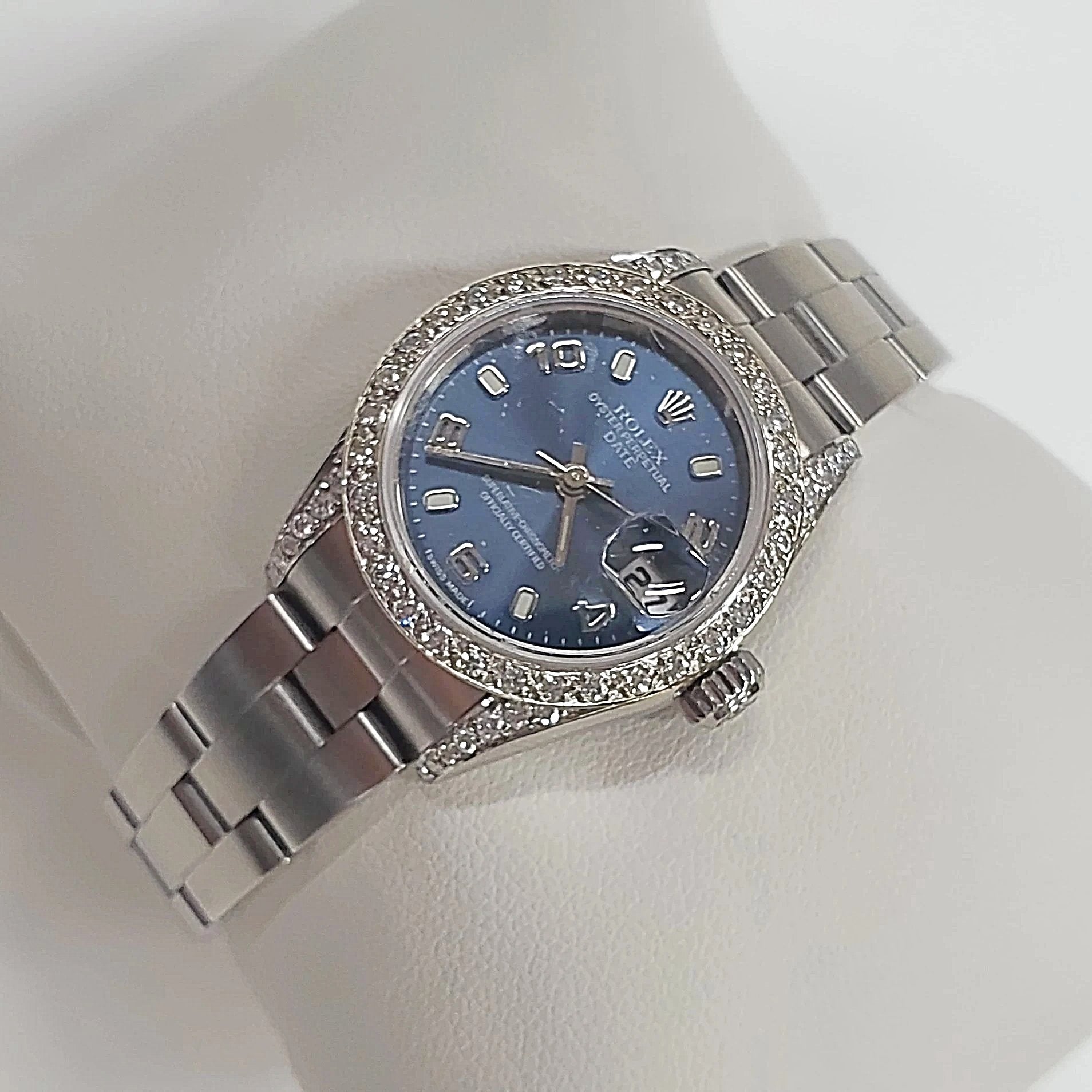 Ladies Rolex 26mm DateJust Stainless Steel Watch with Midnight Blue Dial and Custom Diamond Bezel. (Pre-Owned)