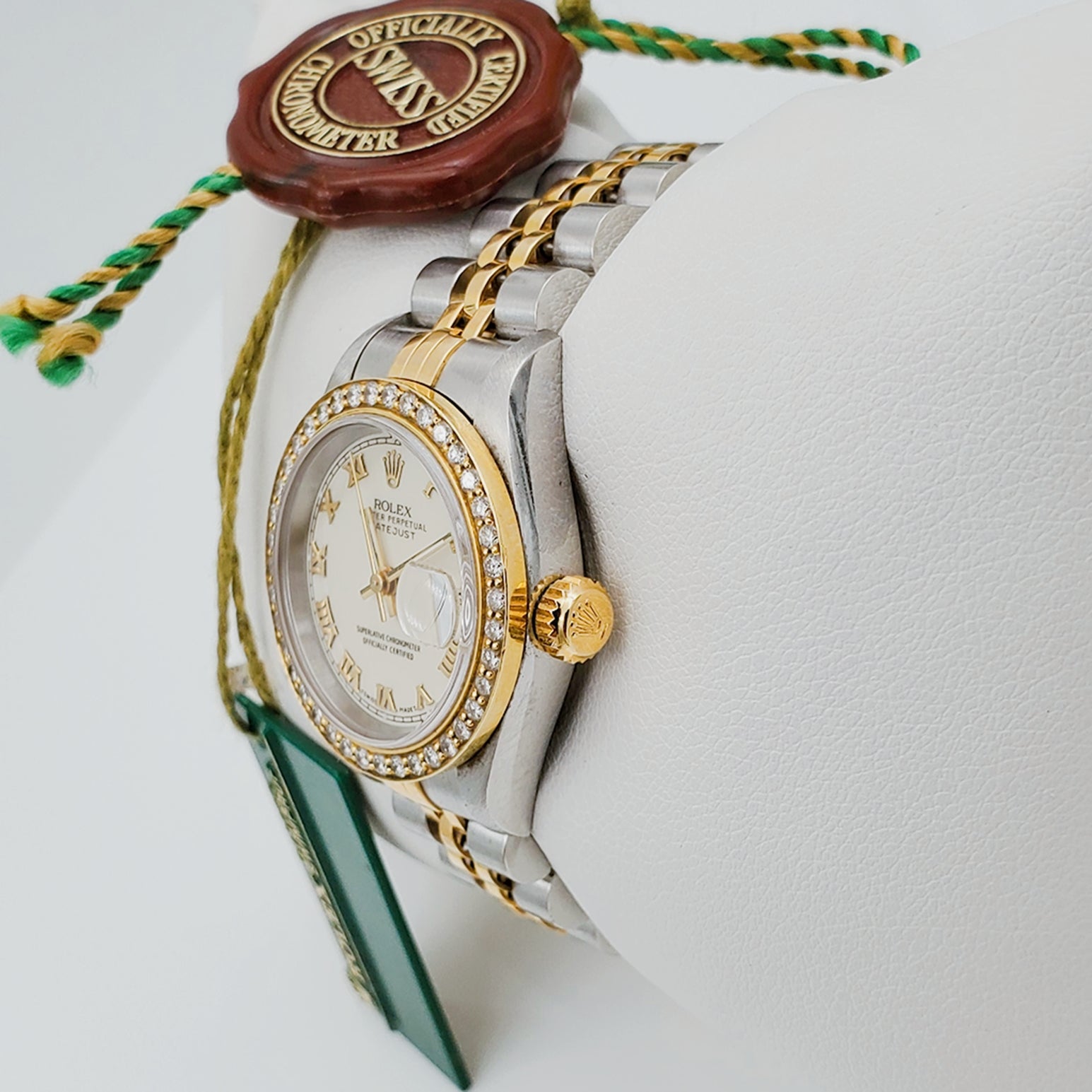 Women's Rolex 18K Gold Two-Tone 26mm DateJust Watch with Off-White Dial, Roman Numerals and Diamond Bezel. (Pre-Owned)