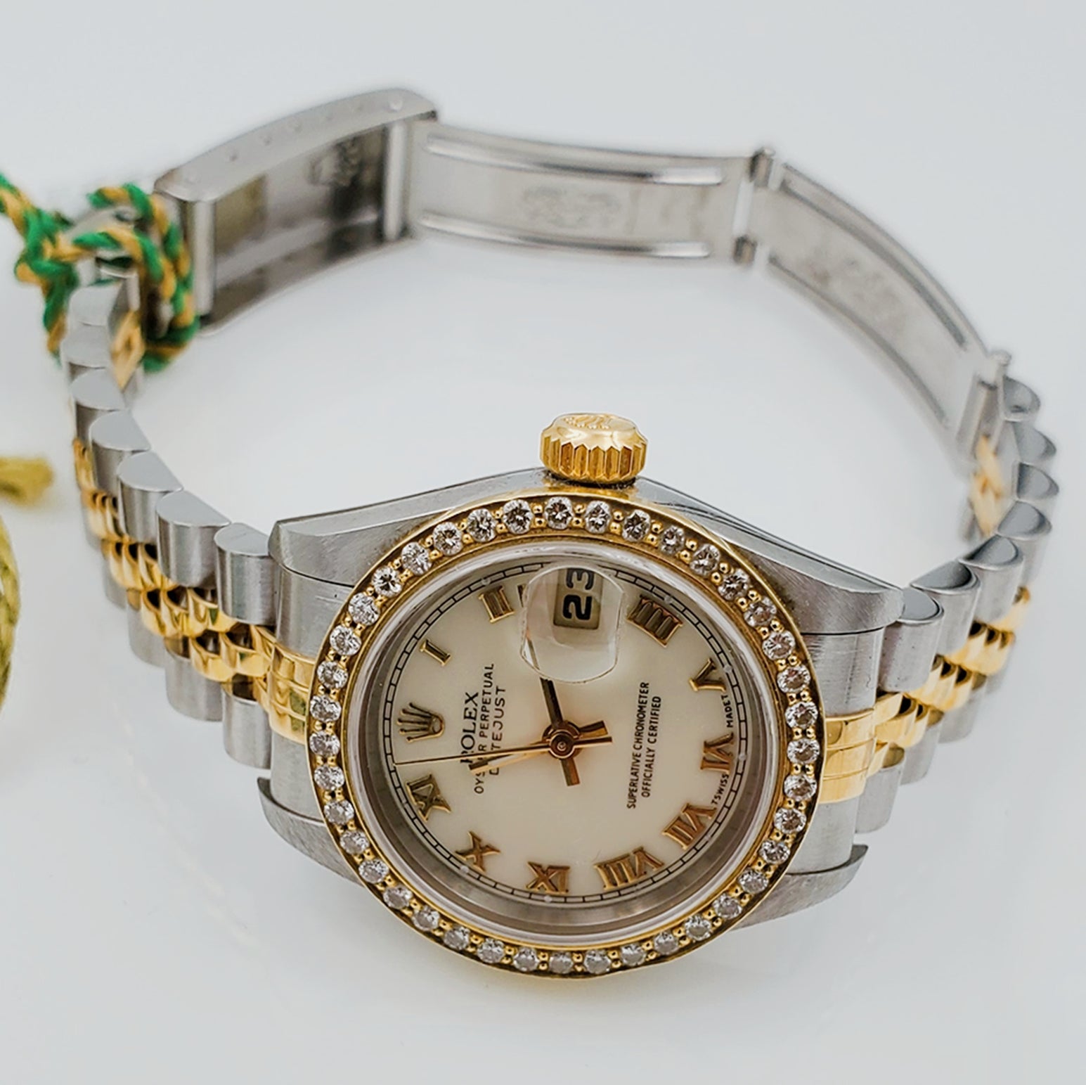Ladies Rolex 18K Gold Two Tone 26mm DateJust Watch with Off-White Dial, Roman Numerals and Diamond Bezel. (Pre-Owned)