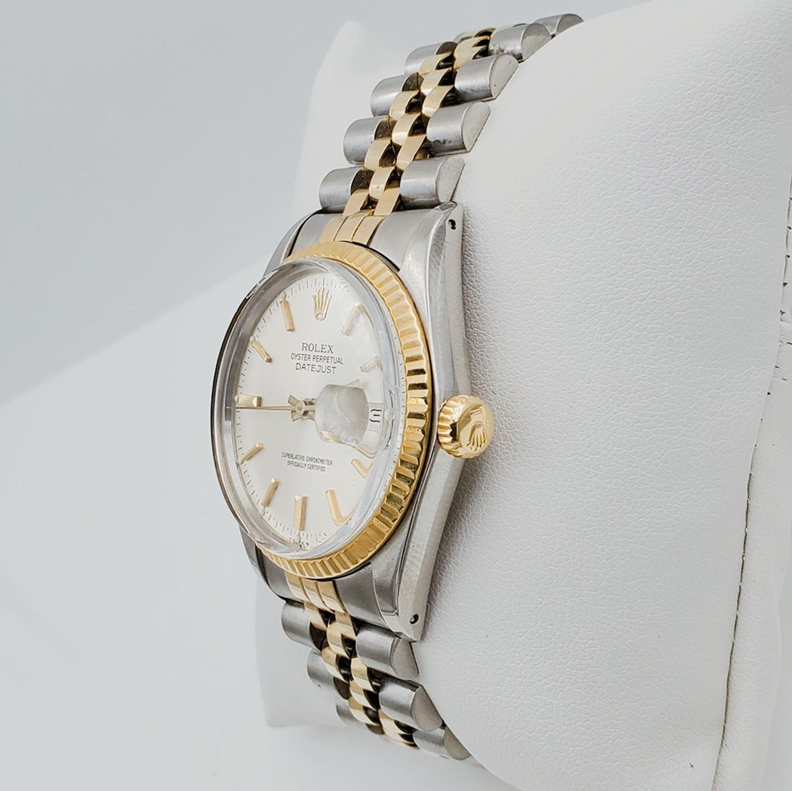 Men's Rolex 36mm DateJust 18k Gold / Stainless Steel Two-Tone Watch with Silver Dial and Fluted Bezel. (Pre-Owned)