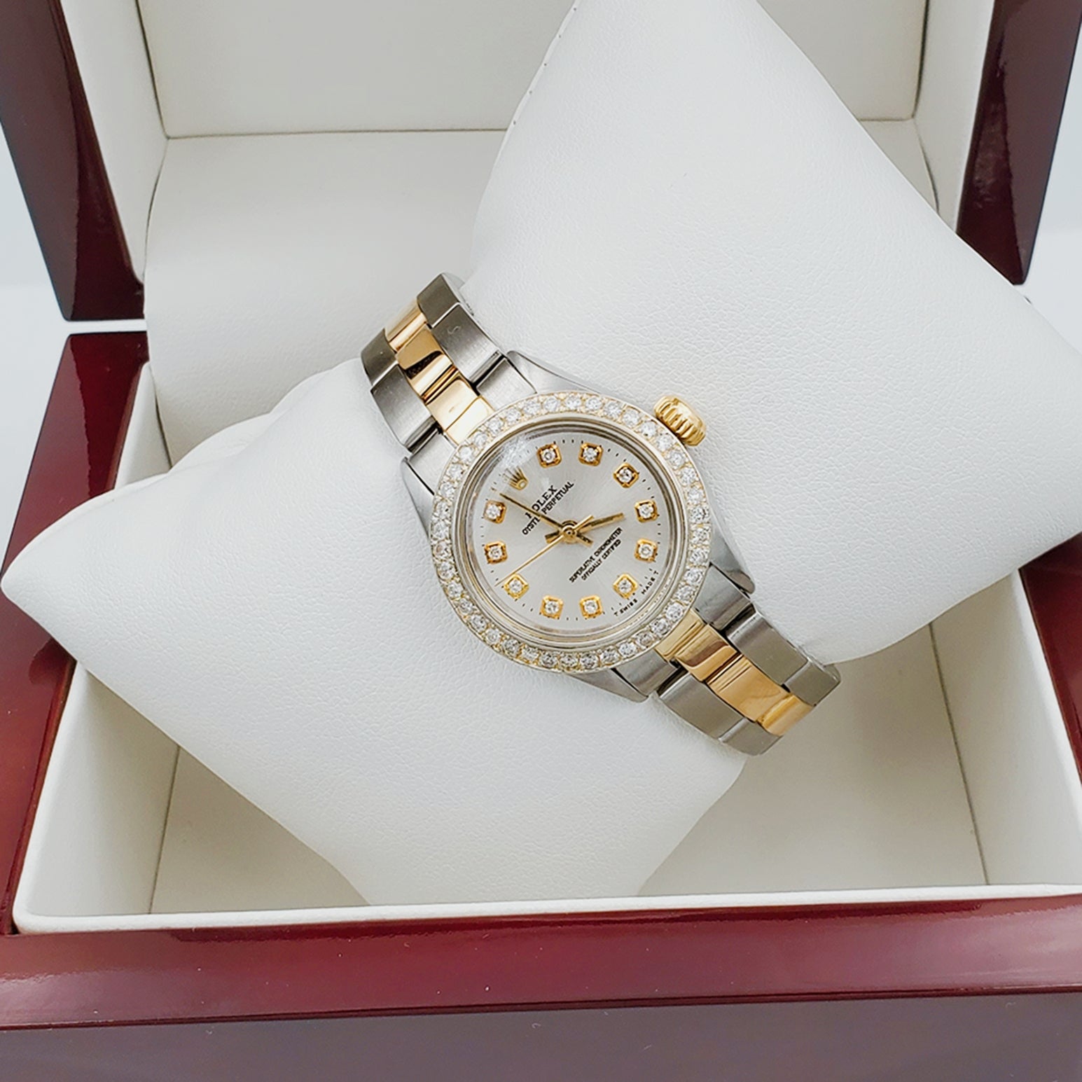 Ladies Rolex 26mm DateJust 18K Two Tone Watch with Silver Diamond Dial and Custom Diamond Bezel. (Pre-Owned)