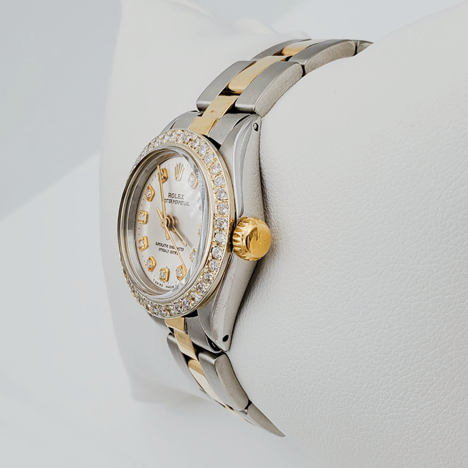 Women's Rolex 26mm DateJust 18K Two-Tone Watch with Silver Diamond Dial and Custom Diamond Bezel. (Pre-Owned)