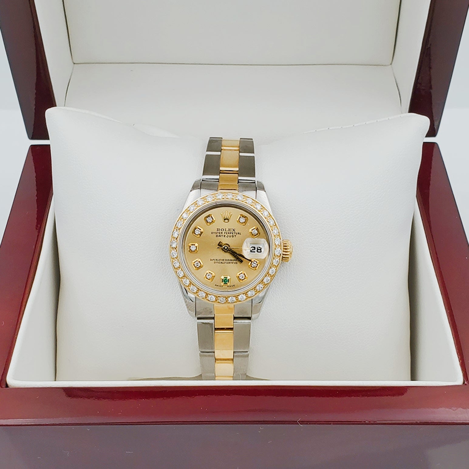 Ladies Rolex 26mm DateJust 18K Gold / Two Tone Watch with Champagne Diamond / Emerald Dial and Custom Diamond Bezel. (Pre-Owned)