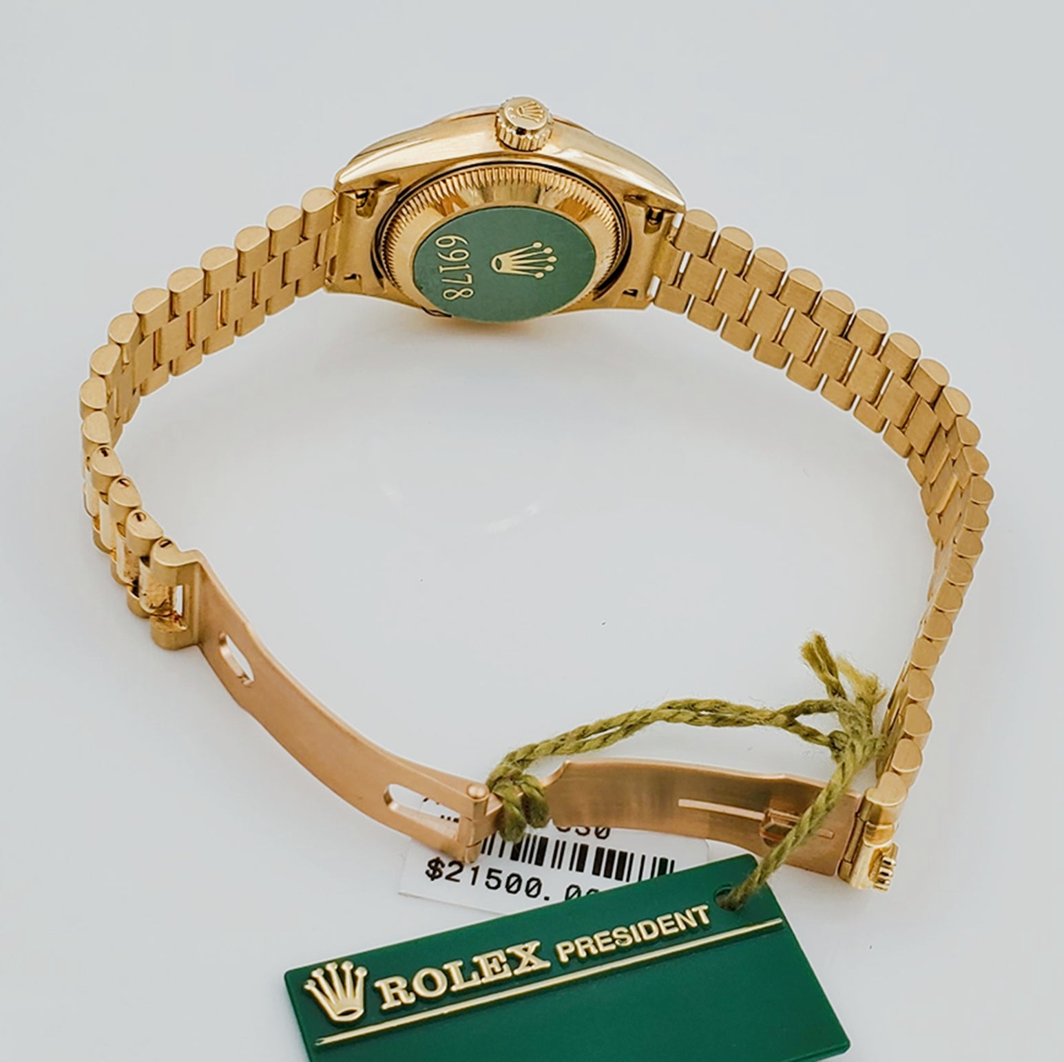Ladies Rolex 26mm Presidential 18K Solid Yellow Gold Watch with Champagne Dial and Fluted Bezel. (NEW 69178)