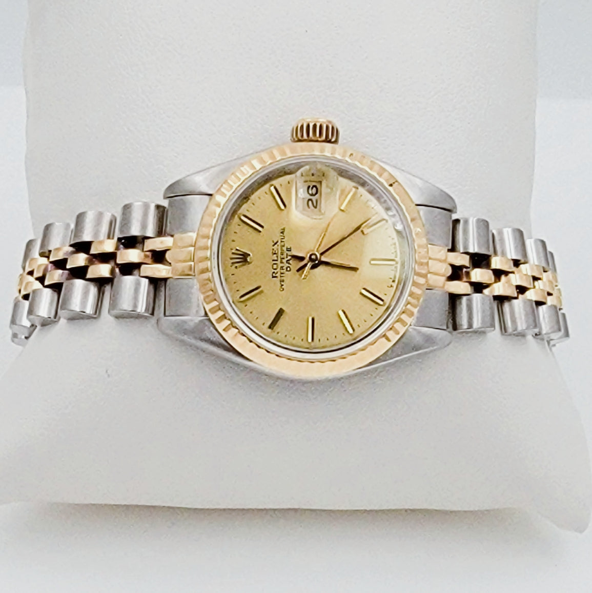 Ladies Rolex 26mm Date Two Tone 18K Yellow Gold / Stainless Steel Watch with Champagne Dial and Fluted Bezel. (Pre-Owned)