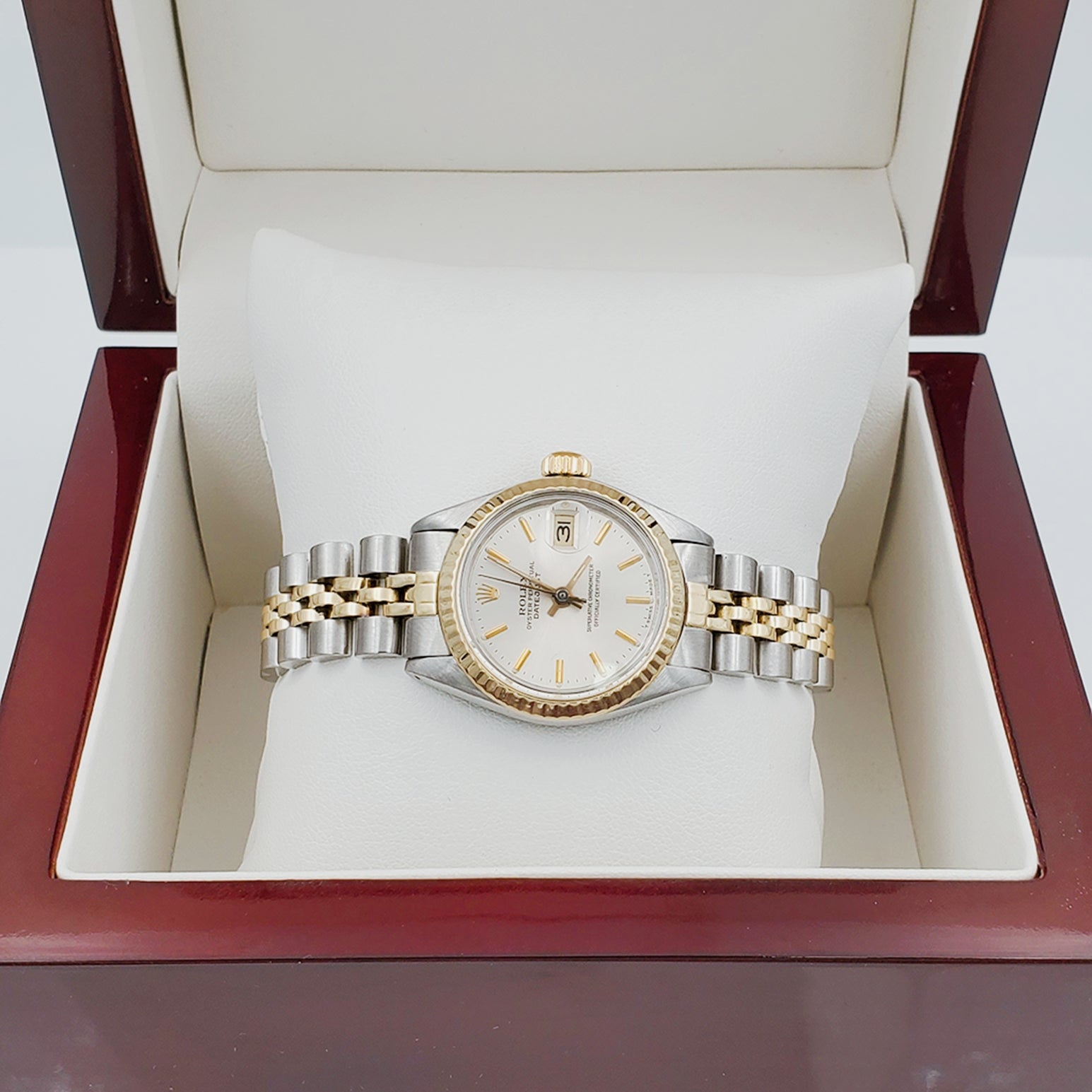Ladies Rolex 26mm DateJust Two Tone 14K Yellow Gold / Stainless Steel Watch with Silver Dial and 14k Fluted Bezel. (Pre-Owned)