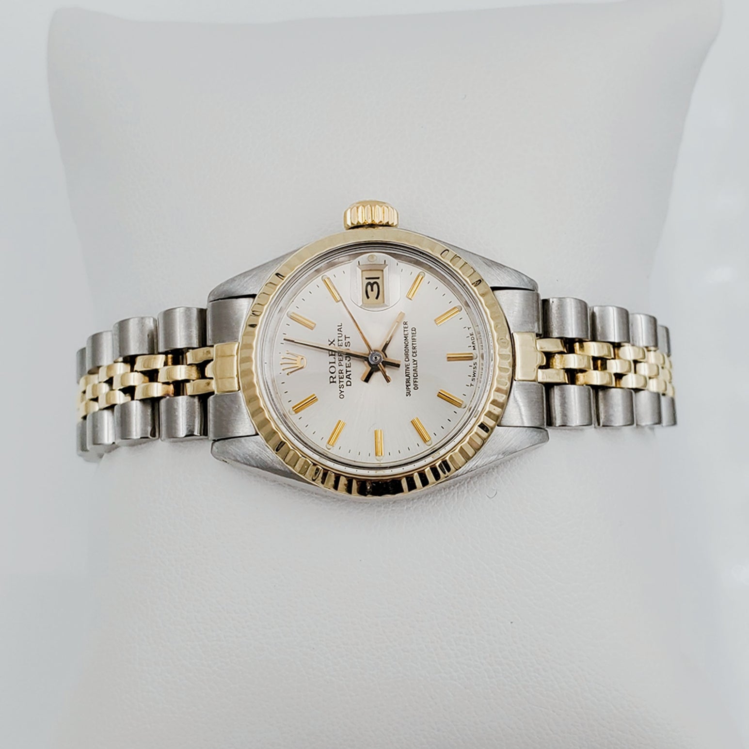 Ladies Rolex 26mm DateJust Two Tone 14K Yellow Gold / Stainless Steel Watch with Silver Dial and 14k Fluted Bezel. (Pre-Owned)