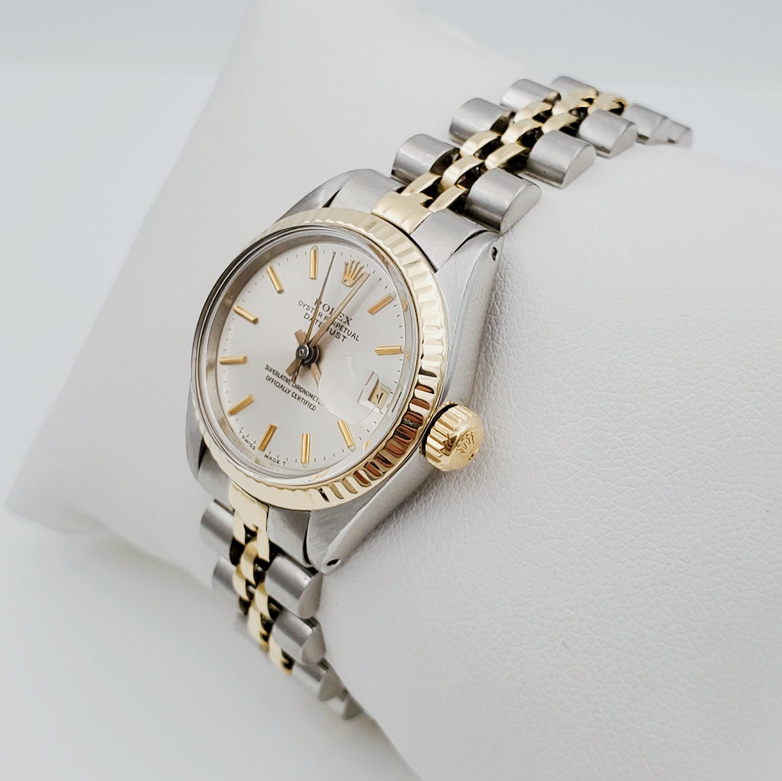 Women's Rolex DateJust 26mm Two-Tone 14K Gold / Stainless Steel Watch with Silver Dial and 14k Fluted Bezel. (Pre-Owned)