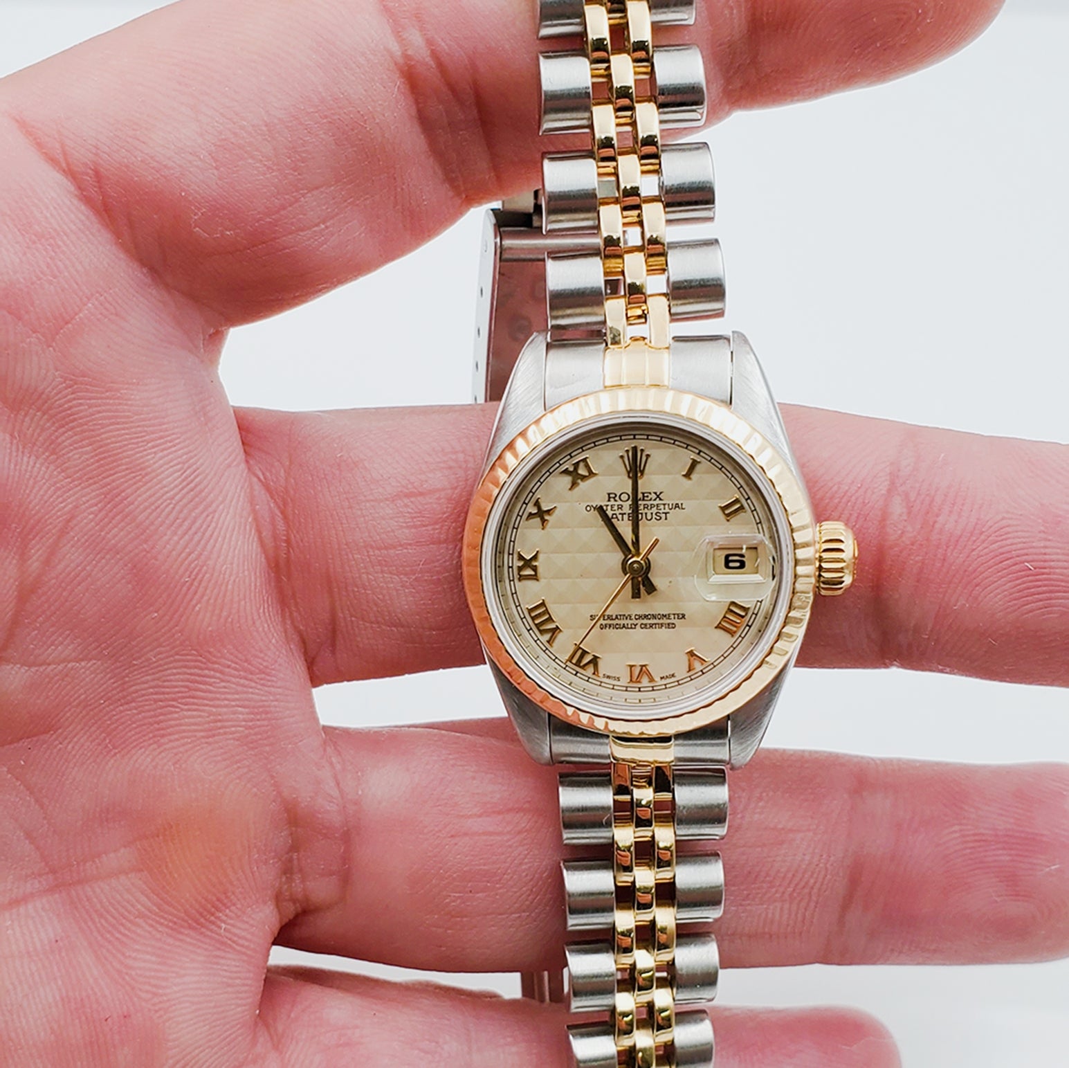 Ladies Rolex 26mm DateJust Two Tone 18K Gold / Stainless Steel Watch with 3D Gold Dial and Fluted Bezel. (Pre-Owned 16233)
