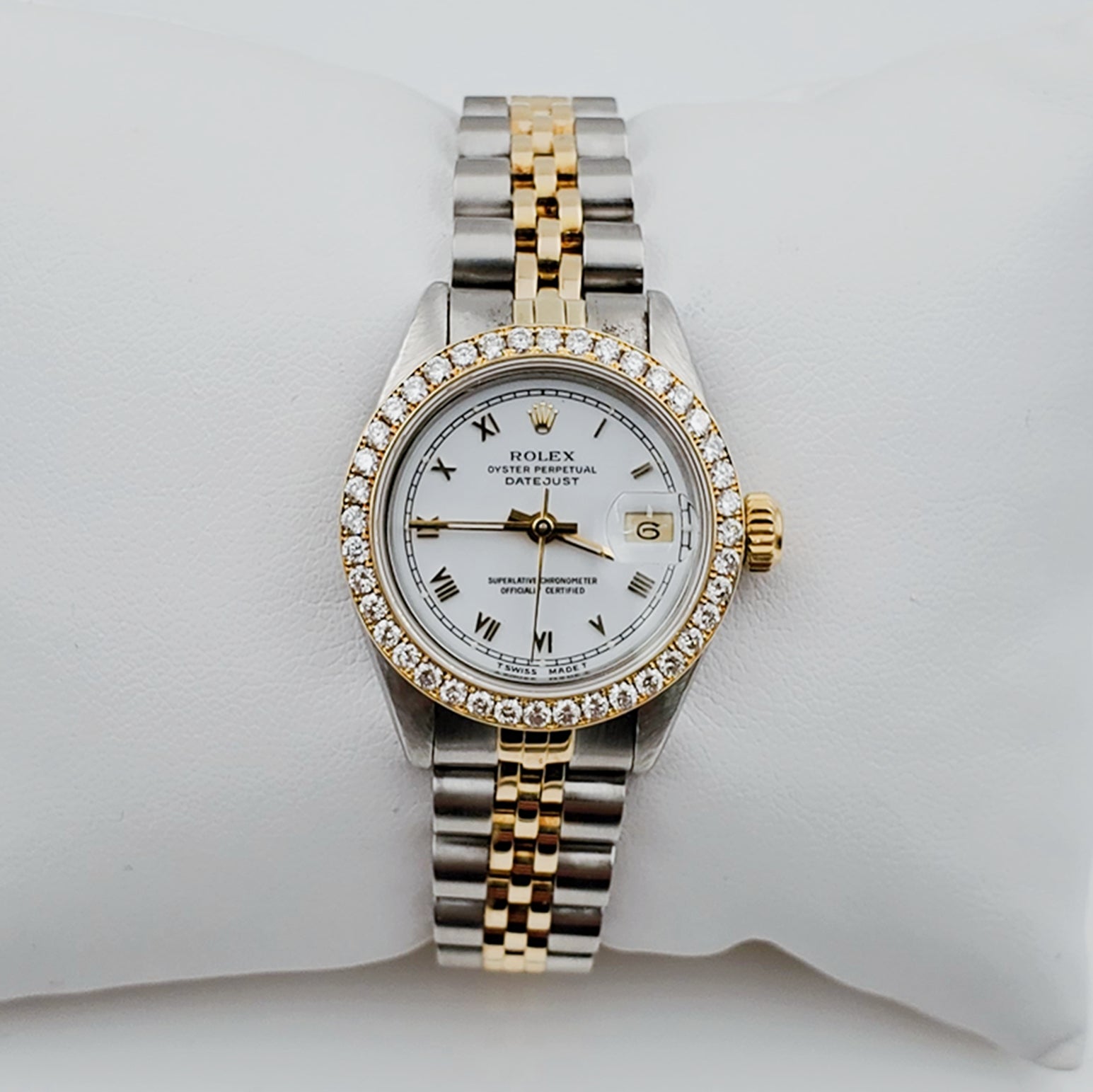 Ladies Rolex 26mm DateJust 18K Gold Two Tone Watch with White Dial, Roman Numerals and Diamond Bezel. (Pre-Owned)