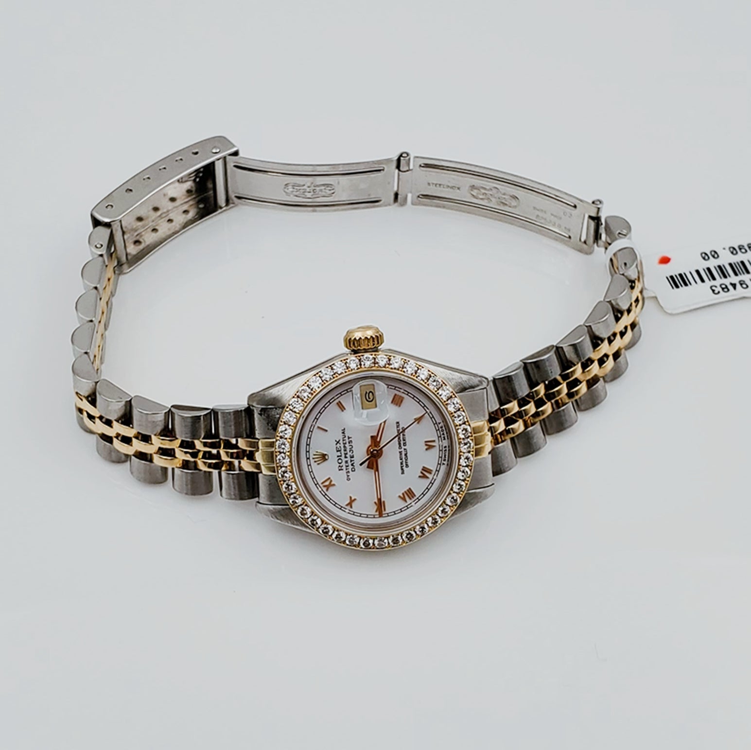 Ladies Rolex 26mm DateJust 18K Gold Two Tone Watch with White Dial, Roman Numerals and Diamond Bezel. (Pre-Owned)