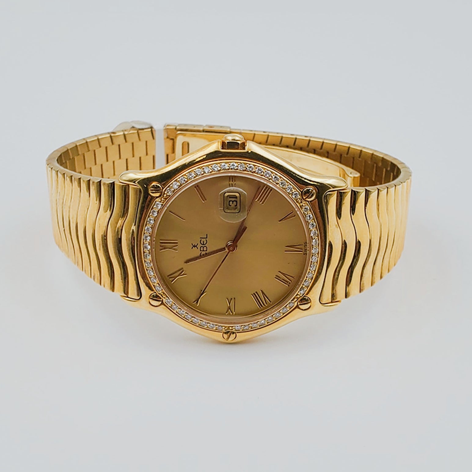 Men's Ebel 36mm Solid 18K Yellow Gold Band Watch with Champagne Dial and Diamond Bezel. (Pre-Owned)