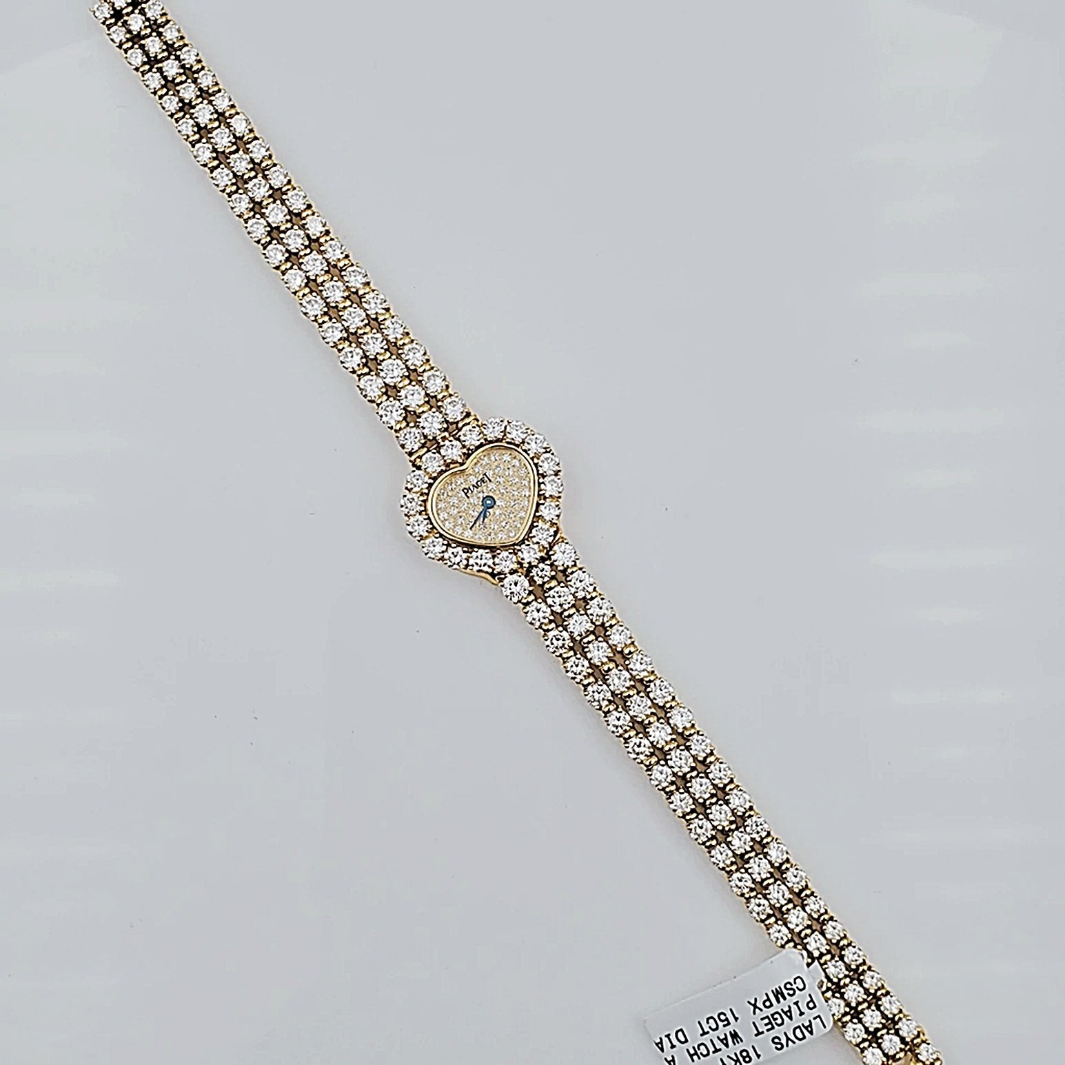 Ladies Piaget Solid 18K Yellow Gold All Diamond 15CT VS1 F Color Bracelet Band Watch with Diamond Dial and Diamond Bezel. (Pre-Owned)
