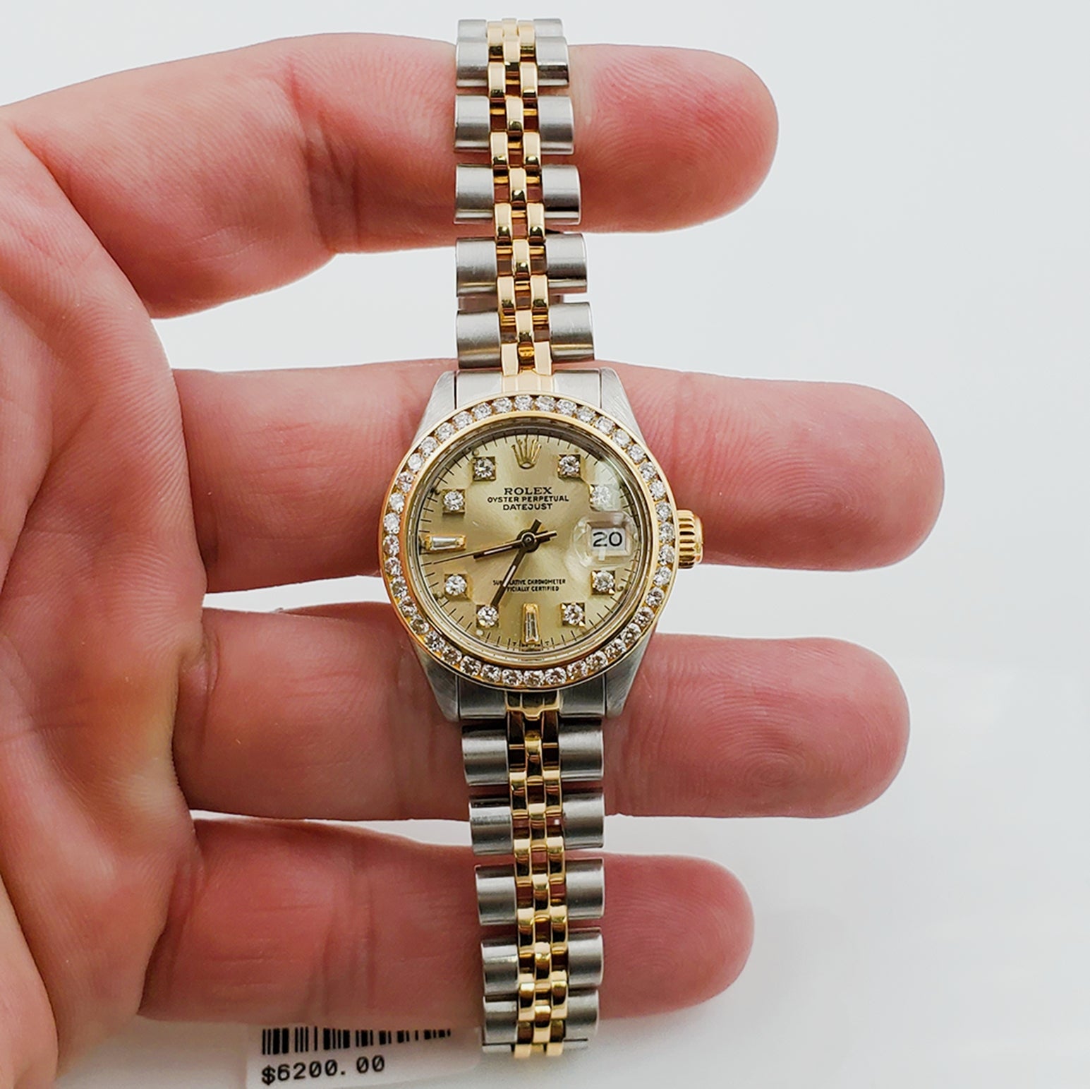 Ladies Rolex 26mm DateJust Two Tone Jubilee Band 18K Gold Watch with Gold Diamond Dial and Diamond Bezel. (Pre-Owned)