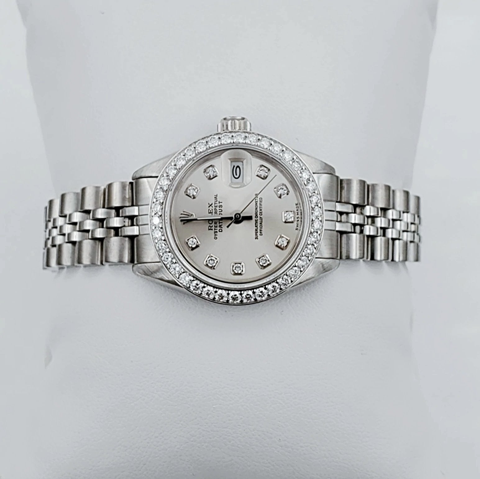 Ladies Rolex 26mm DateJust Stainless Steel Watch with Silver Diamond Dial and Diamond Bezel. (Pre-Owned 69174)