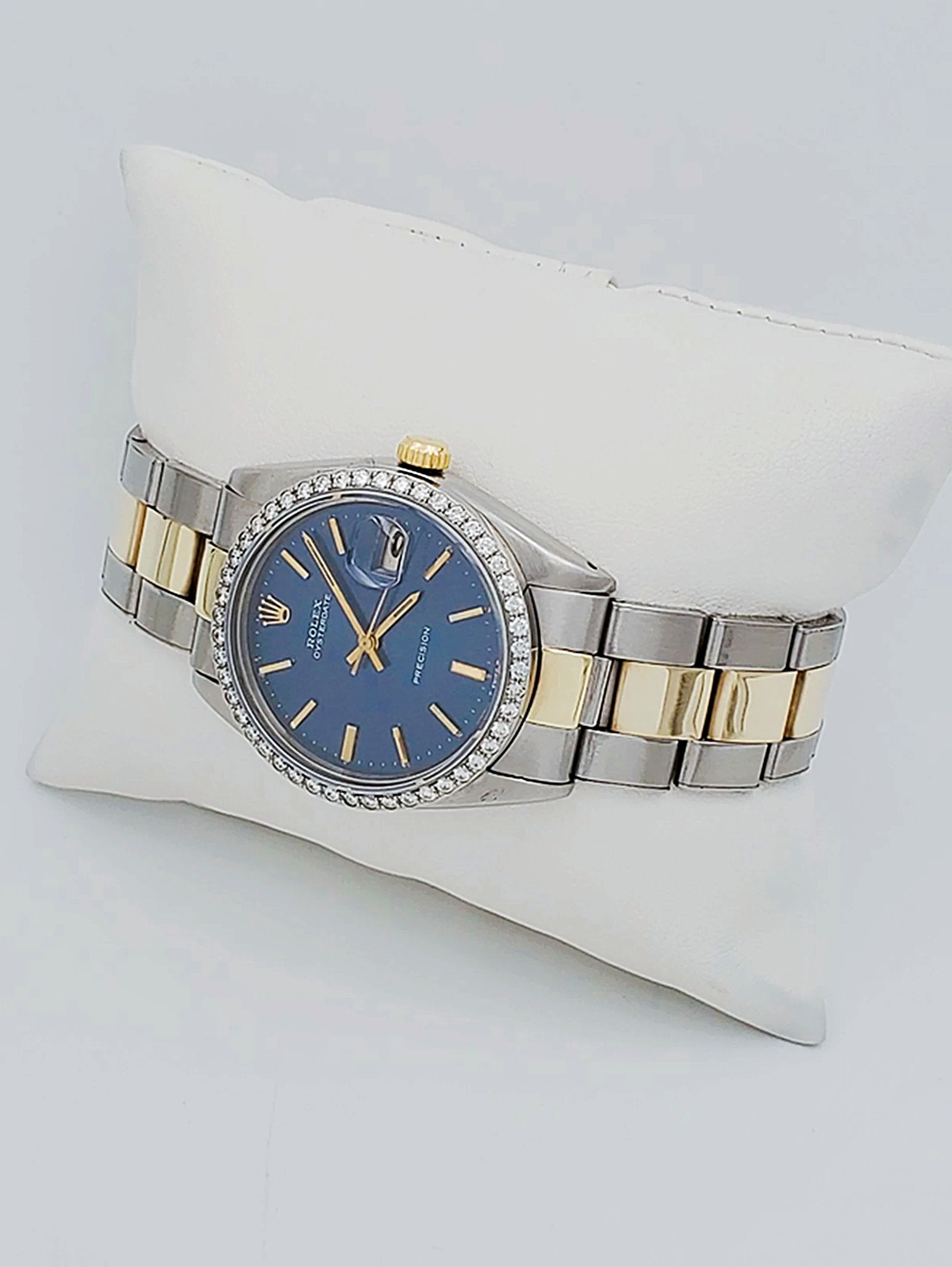 Unisex Rolex OysterDate 34mm Two Tone 14K Yellow Gold / Stainless Steel Watch with Blue Dial and Custom Diamond Bezel. (Pre-Owned 6694)