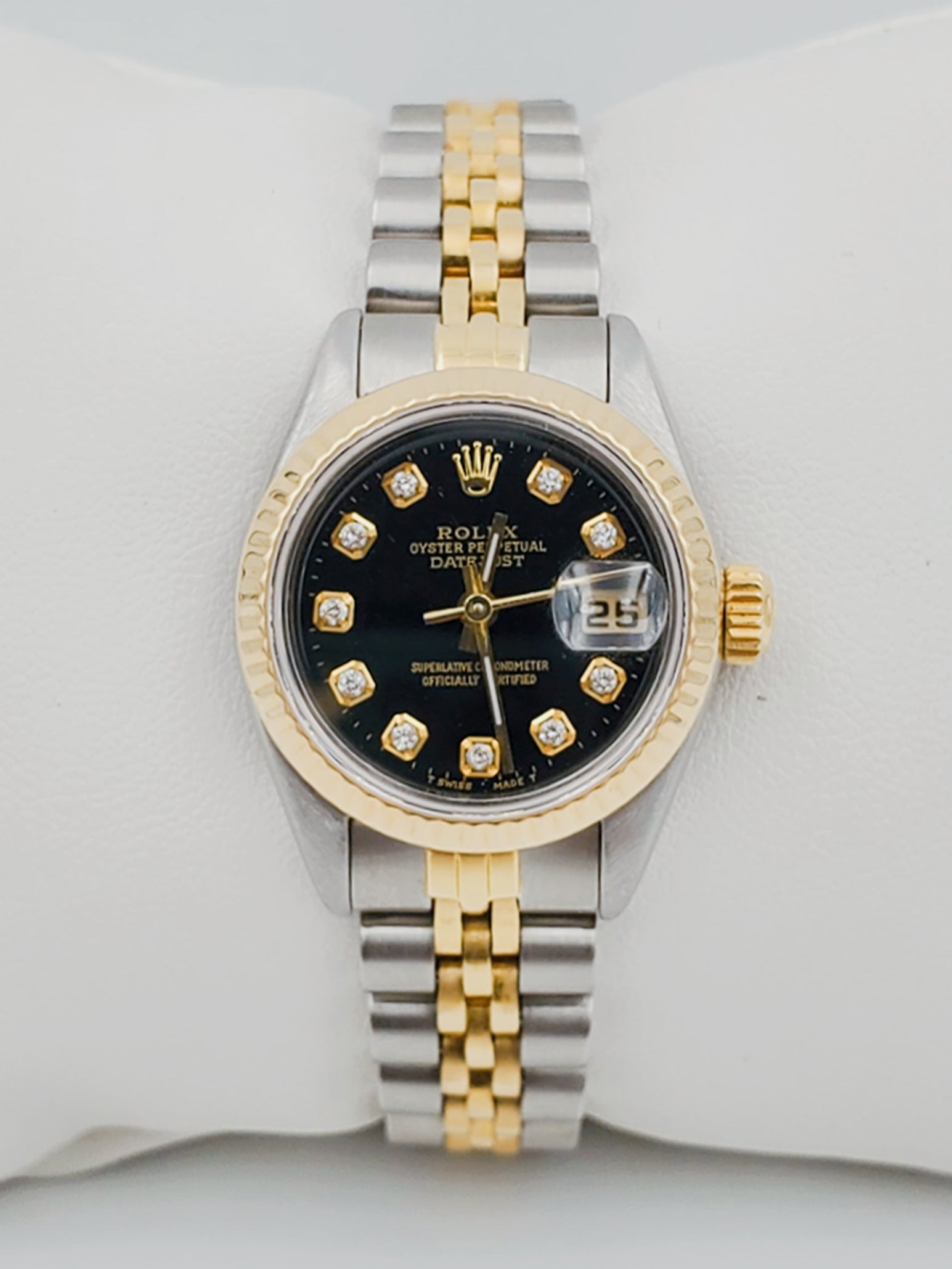 Ladies Rolex 26mm DateJust Two Tone 18K Gold / Stainless Steel Watch with Black Diamond Dial and Fluted Bezel. (Pre-Owned)