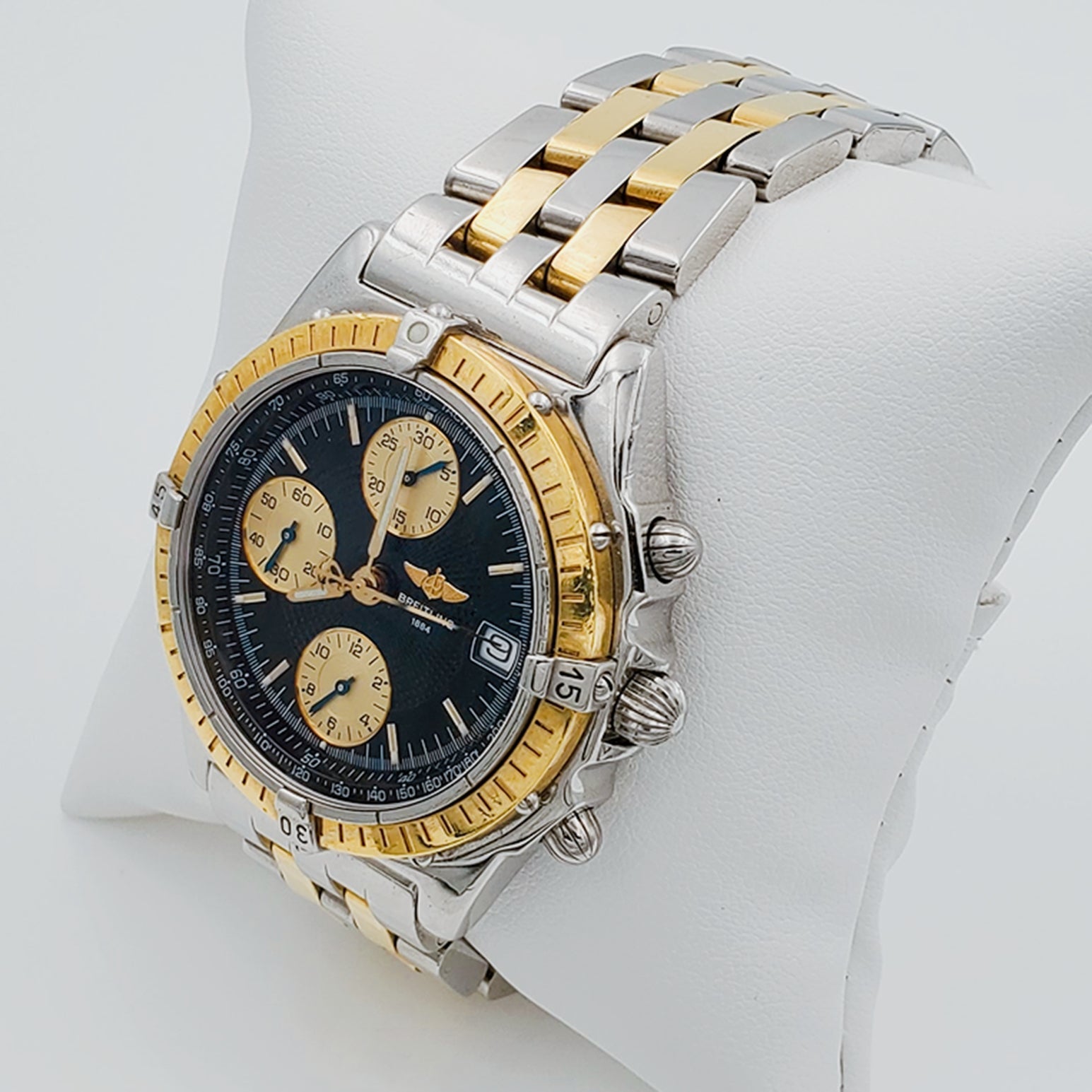 Men's Breitling Chronograph 40mm 18K Yellow Gold / Stainless Steel Watch with Black Dial and Gold Bezel. (Pre-Owned B13356)