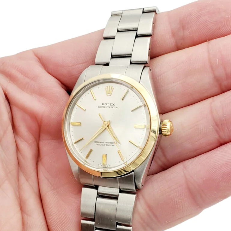 Men's Rolex 34mm Vintage Oyster Perpetual Stainless Steel Watch with Silver Dial and Smooth Bezel. (Pre-Owned 1002)