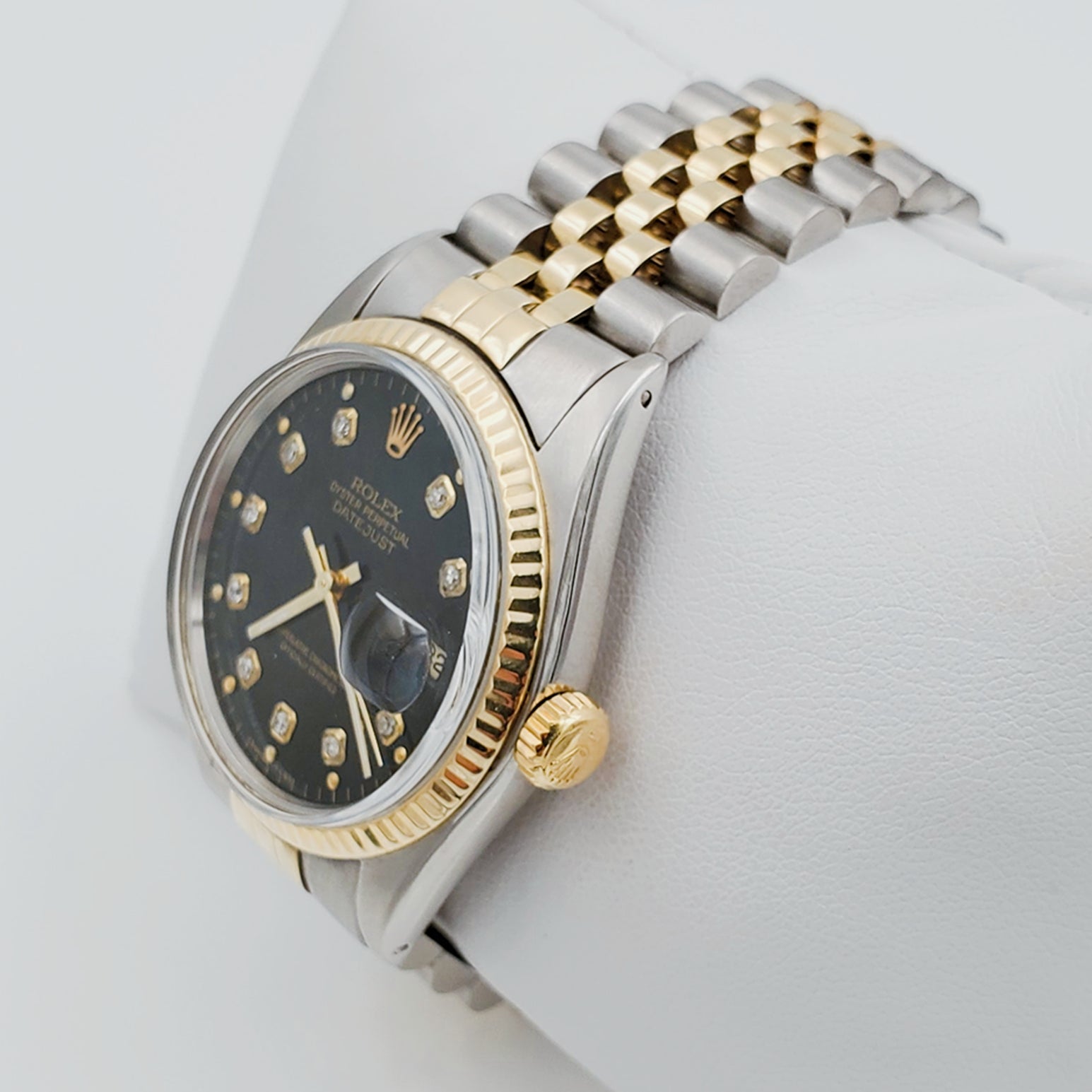 Men's Rolex 36mm DateJust 18K Gold / Stainless Steel Two-Tone Watch with Black Diamond Dial and Fluted Bezel. (Pre-Owned)