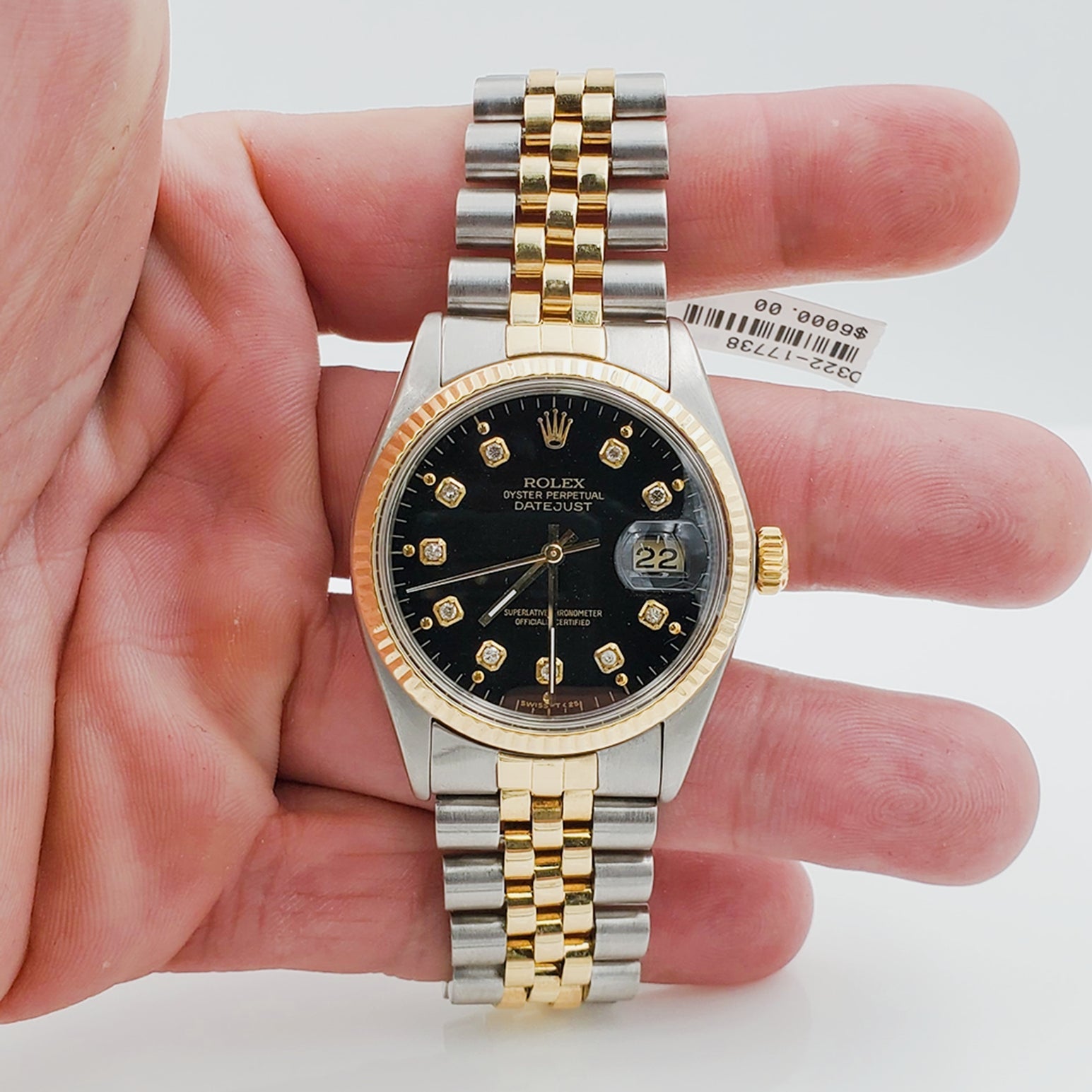Men's Rolex 36mm DateJust 18K Gold / Stainless Steel Two Tone Watch with Black Diamond Dial and Fluted Bezel. (Pre-Owned 16233)