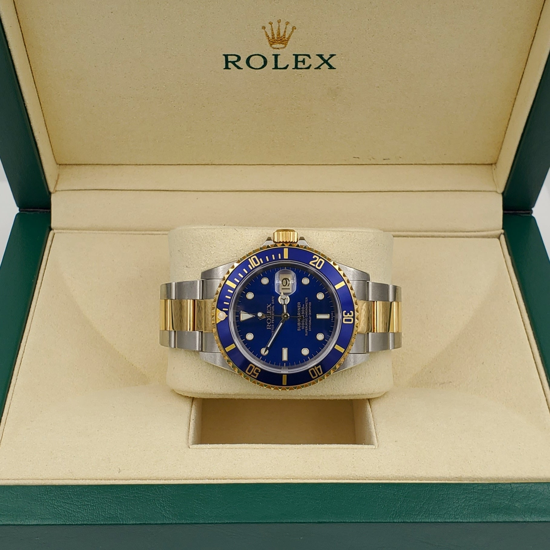 2004 Men's Rolex 40mm Submariner Oyster Perpetual Two Tone 18K Yellow Gold / Stainless Steel Watch with Blue Dial and Blue Bezel. (Pre-Owned 16613)