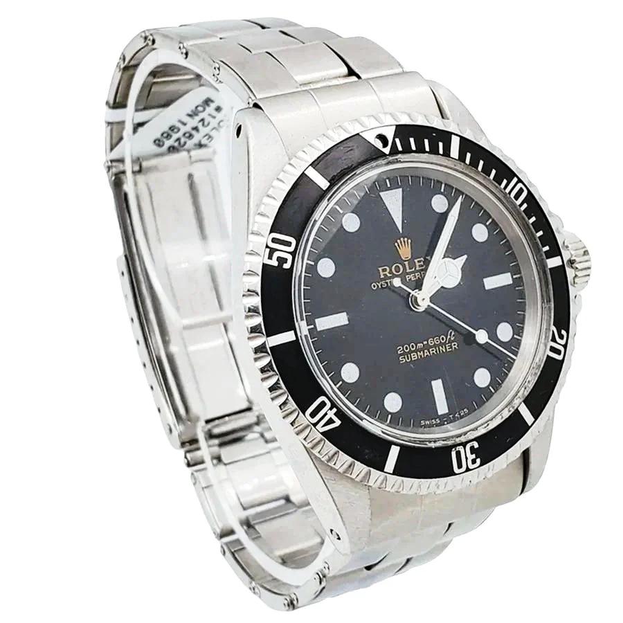 Men's Rolex 40mm Vintage 1960 Submariner Stainless Steel Watch with Black Dial and Fluted Bezel. (Pre-Owned 5513)