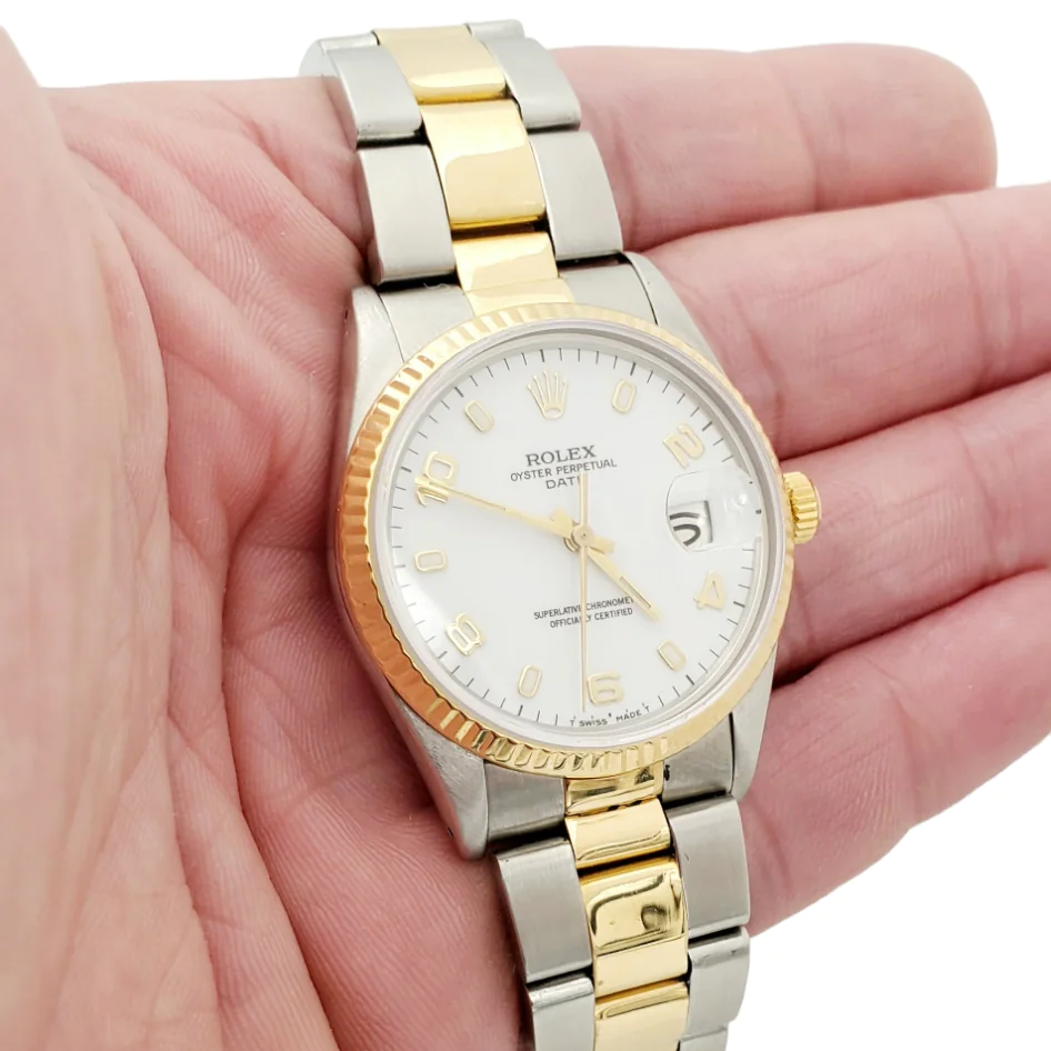 Men's Rolex Date 34mm Two Tone Oyster Perpetual 18K Yellow Gold / Stainless Steel Watch with White Dial and Fluted Bezel. (Pre-Owned 15003)