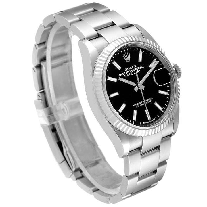 Ladies Midsize Rolex 31mm DateJust Stainless Steel Watch with Black Dial and Fluted Bezel. (Pre-Owned 17824C)