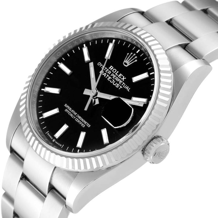 Ladies Midsize Rolex 31mm DateJust Stainless Steel Watch with Black Dial and Smooth Bezel. (Pre-Owned 17824C)