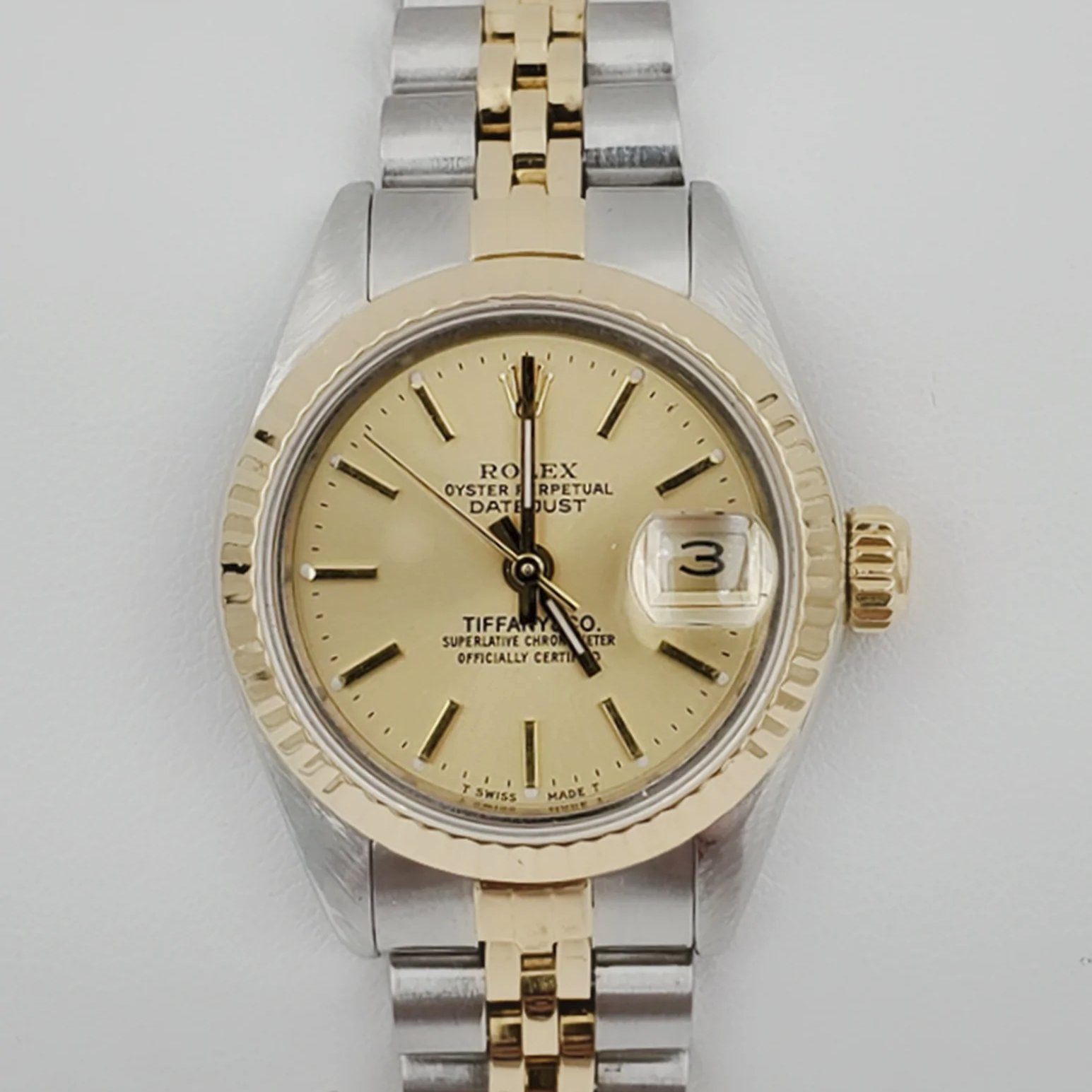 Women's Rolex 26mm Vintage DateJust Two-Tone 18K Gold Watch with Champagne Tiffany Dial and Fluted Bezel. (Pre-Owned)