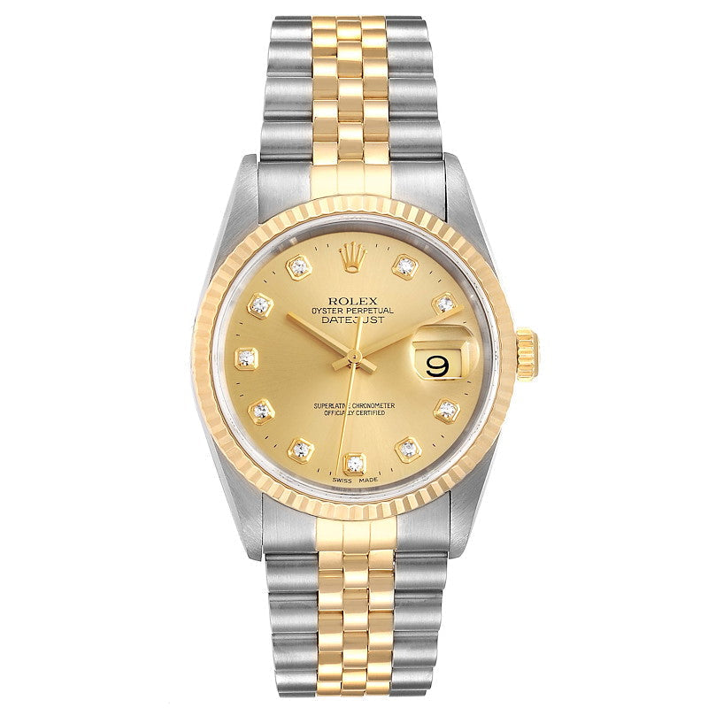 Women's Rolex DateJust 26mm Two-Tone 18K Yellow Gold / Stainless Steel Watch with Champagne Diamond Dial and Fluted Bezel. (Pre-Owned 69173)