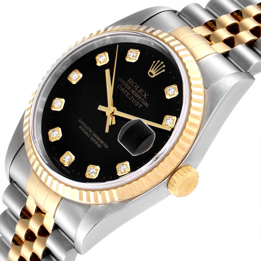 Ladies Rolex 26mm DateJust Two Tone 18K Yellow Gold / Stainless Steel Watch with Black Diamond Dial and Fluted Bezel. (Pre-Owned)