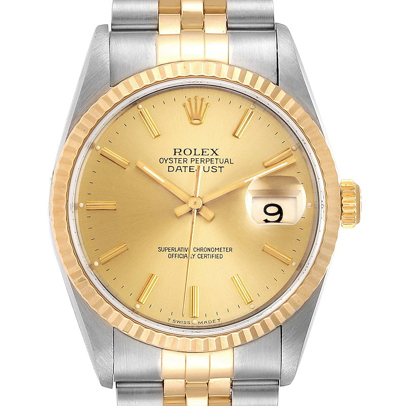 Ladies Rolex 26mm DateJust Two Tone 18K Gold Watch with Champagne Dial and 18k Fluted Bezel. (Pre-Owned)