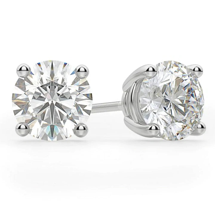 14K White Gold Four Prong Round 1.40 CT (TW) VS1 Color H Diamond Stud Earrings.