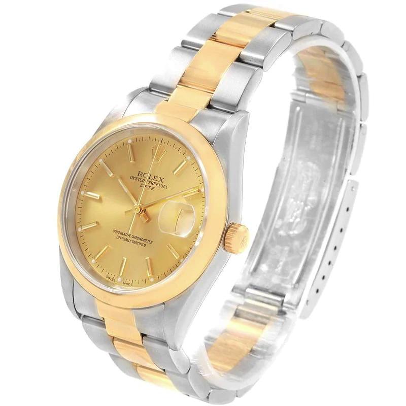Ladies Rolex 26mm DateJust 18K Two Tone Watch with Champagne Dial and Smooth Bezel. (Pre-Owned)